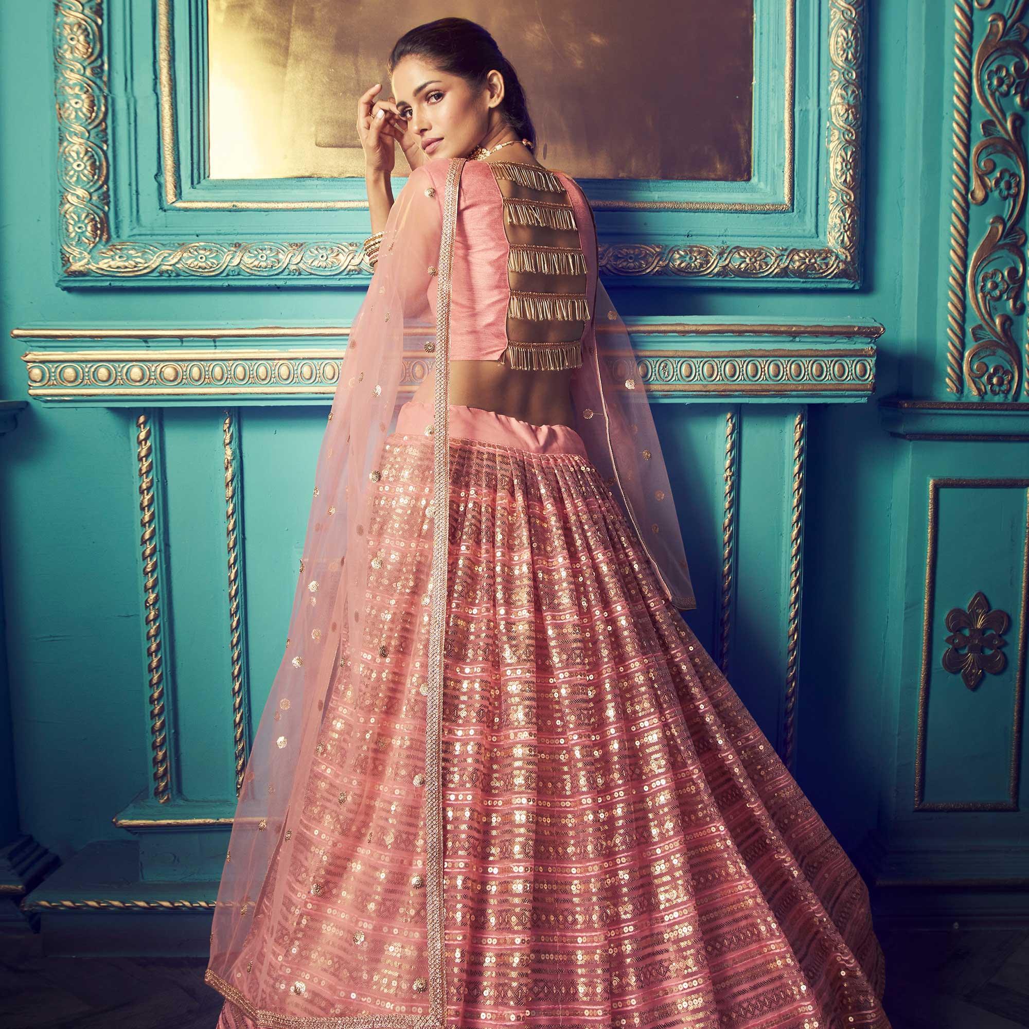 Ravishing Pink Colored Partywear Embroidered Soft Net Lehenga Choli - Peachmode