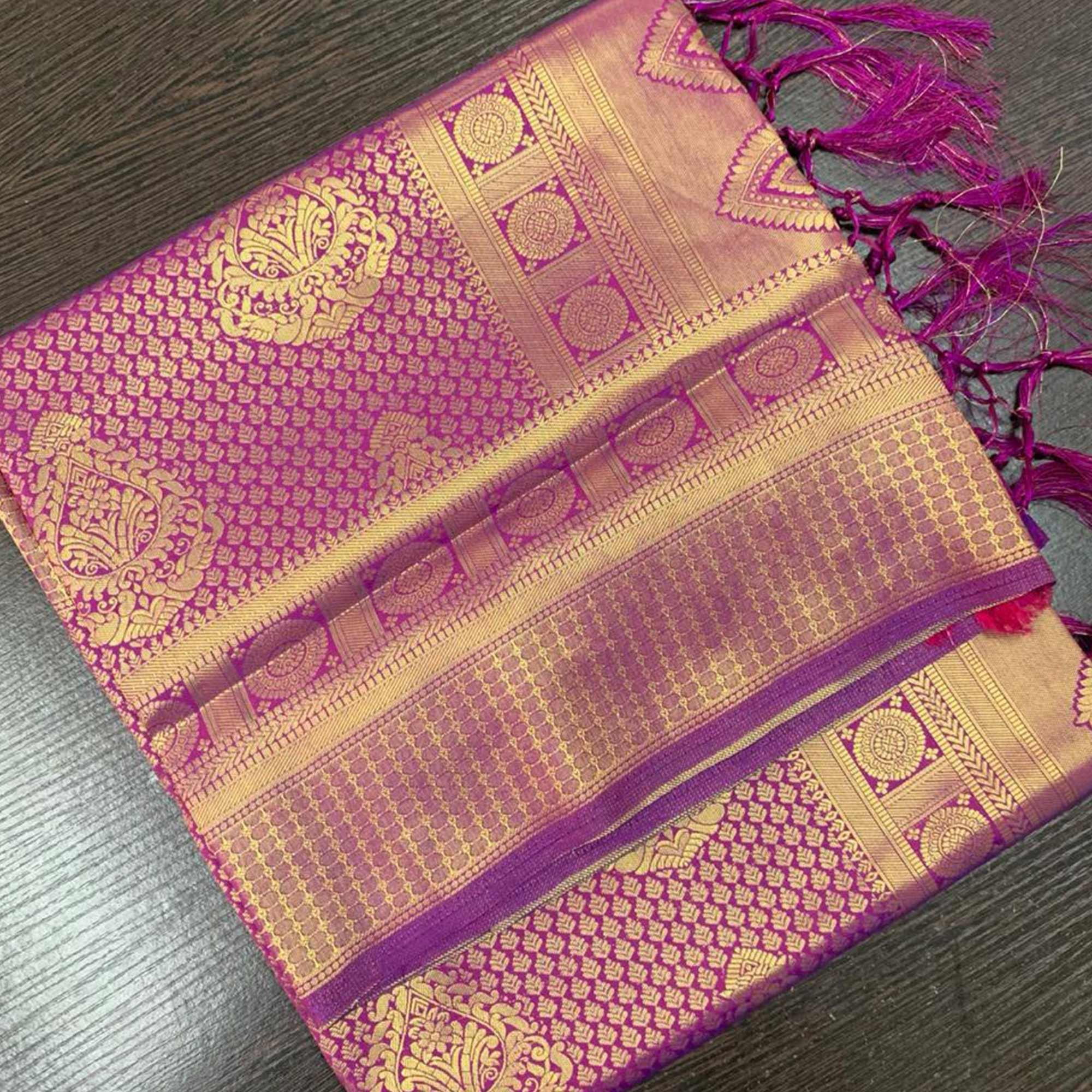Ravishing Purple Colored Festive Wear Woven Silk Saree With Tassels - Peachmode