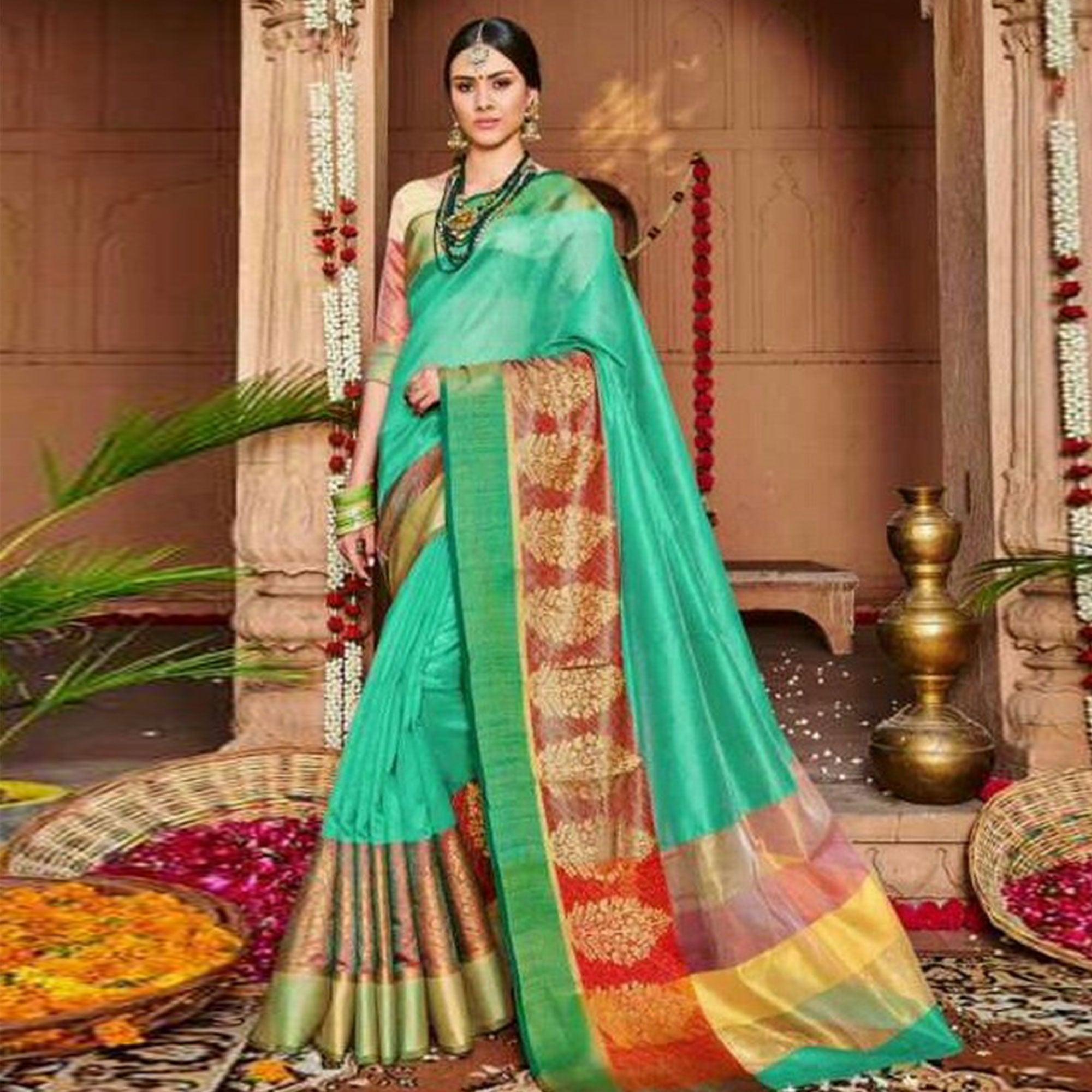Ravishing Turquoise Green Colored Festive Wear Woven Art Silk Saree - Peachmode