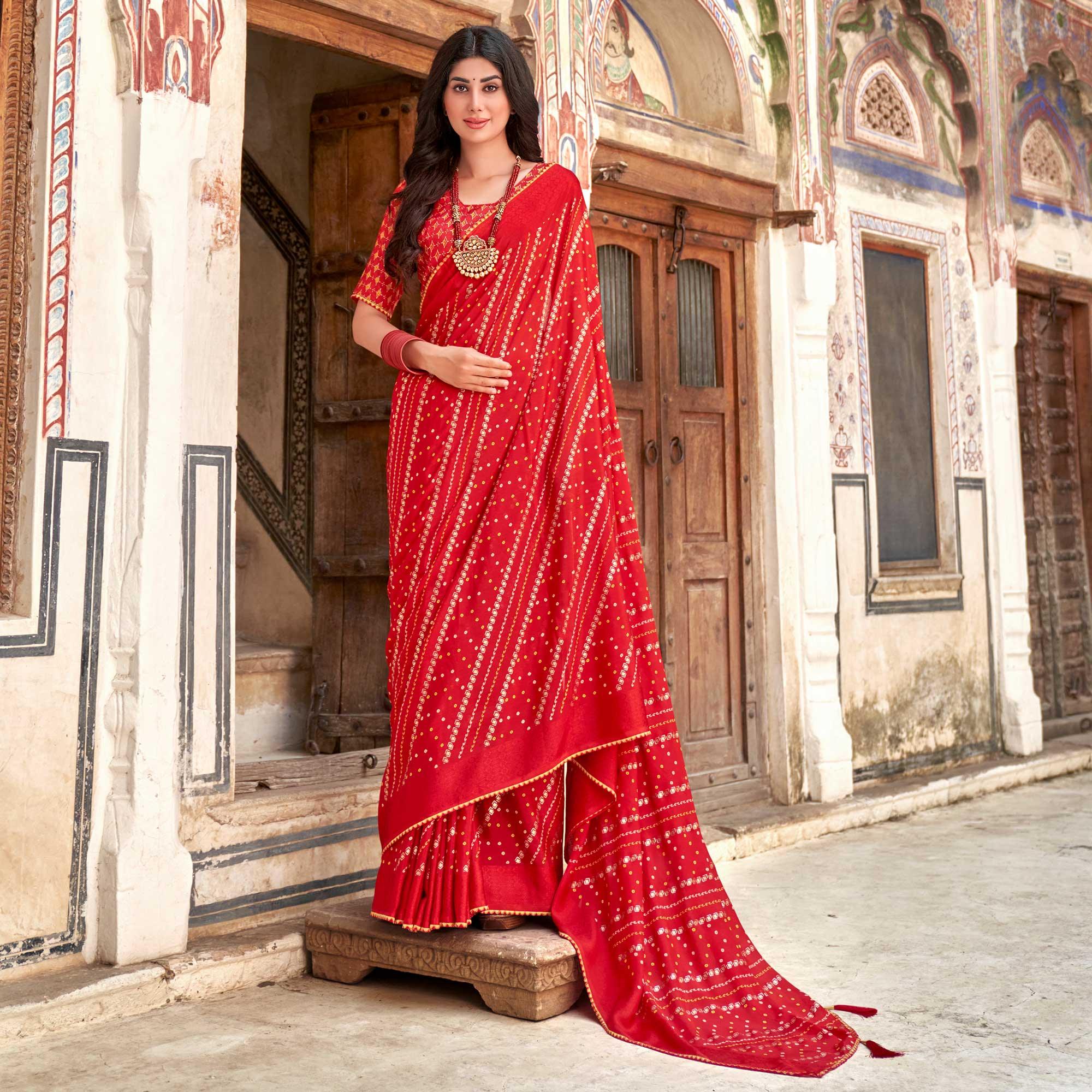 Red Bandhani Printed Chiffon Saree With Tassels - Peachmode