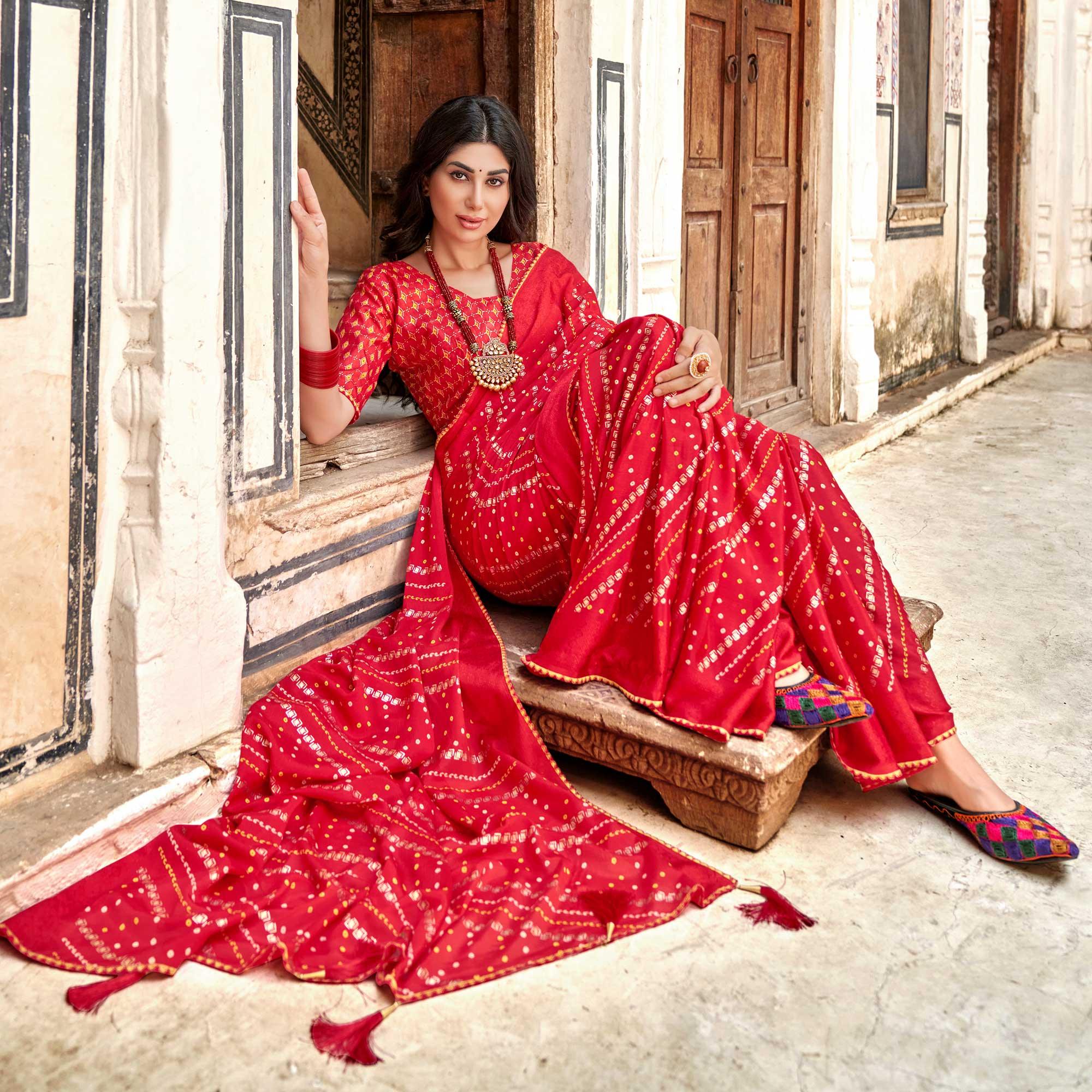 Red Bandhani Printed Chiffon Saree With Tassels - Peachmode