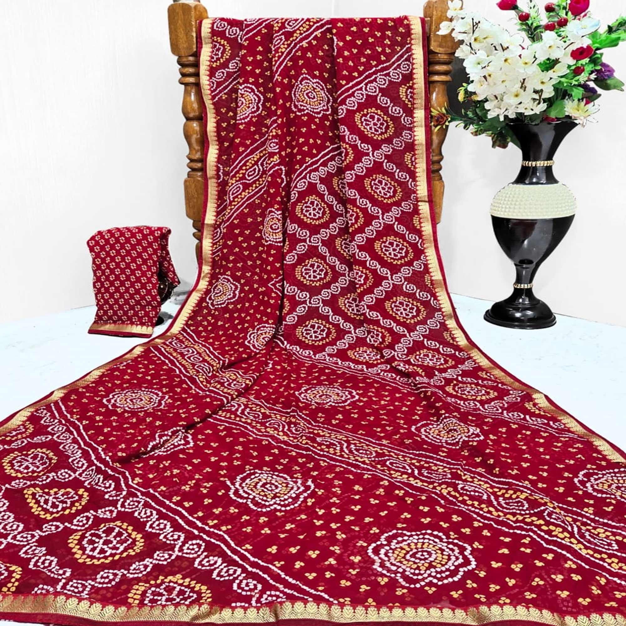 Red Casual Wear Bandhani Printed Georgette Saree With Designer Border - Peachmode