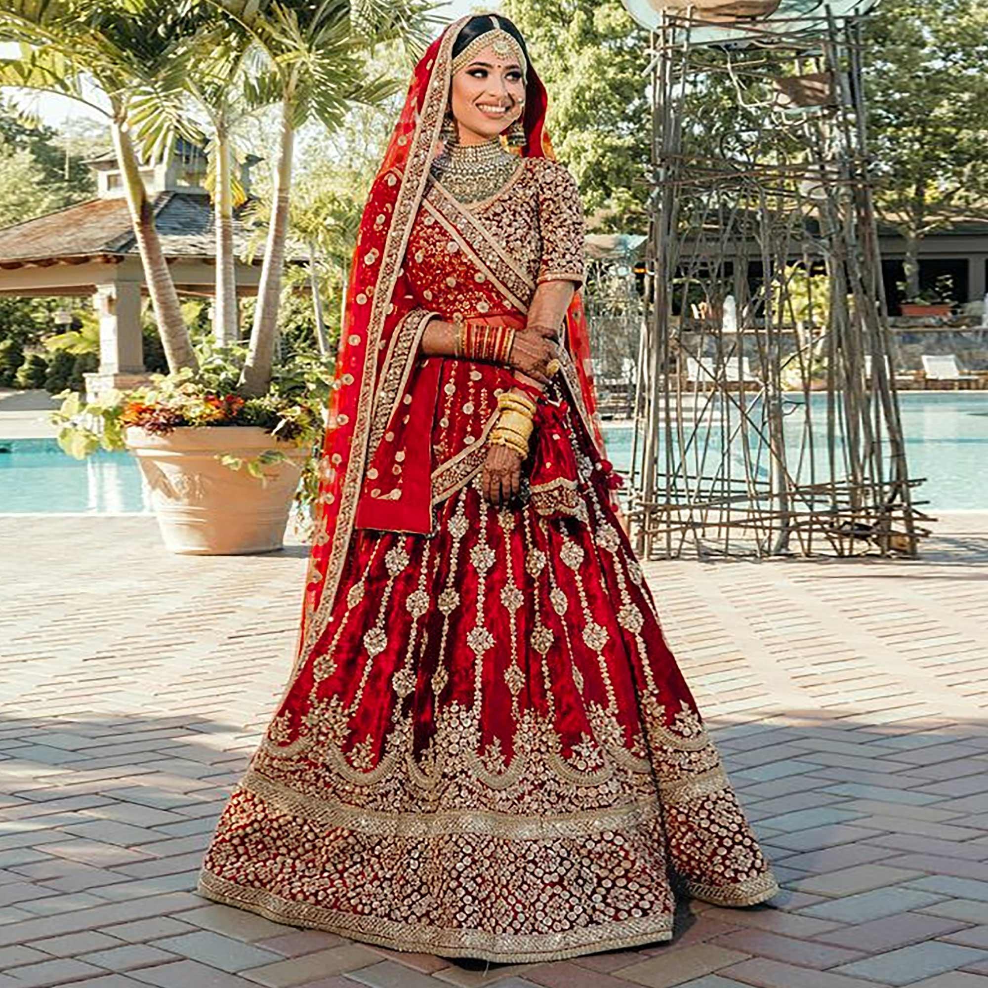 Red Wedding Wear Embroidered With Embellished Velvet Lehenga Choli - Peachmode