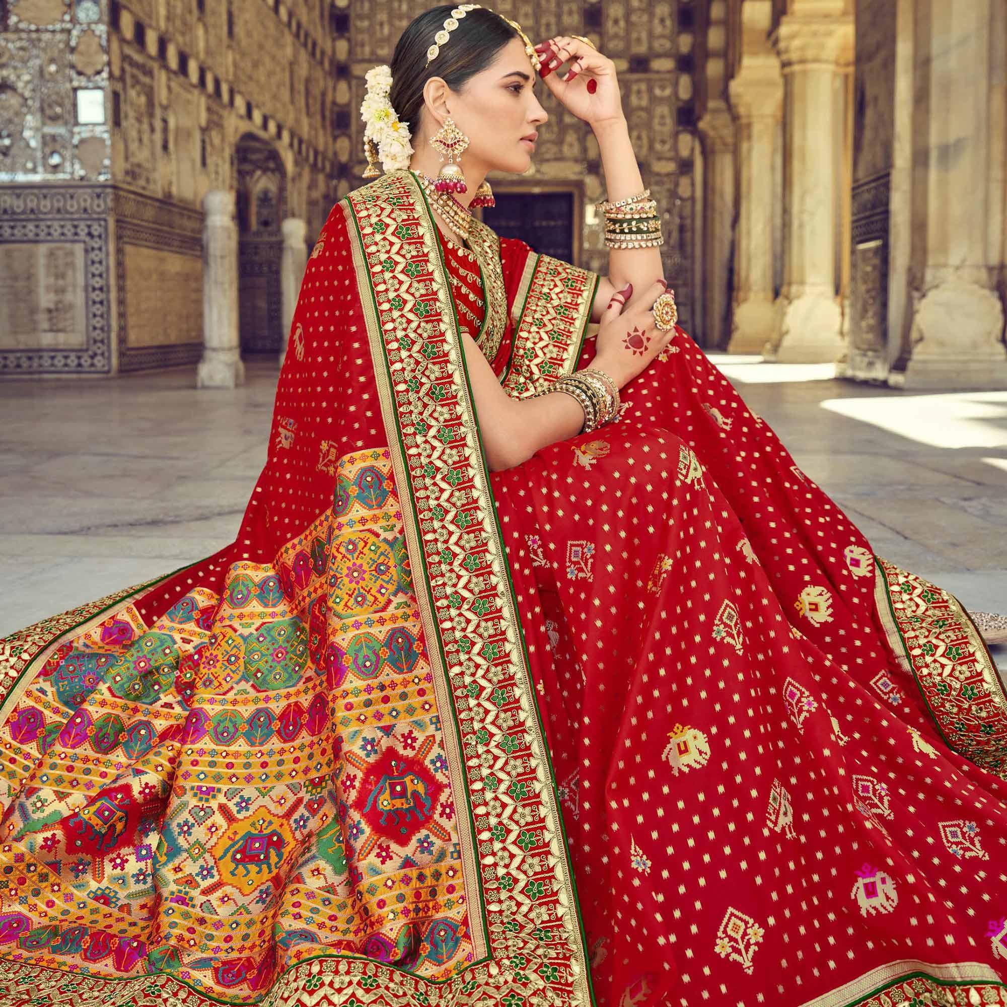 Red Wedding Wear Resham With Embellished Silk Patola Saree - Peachmode