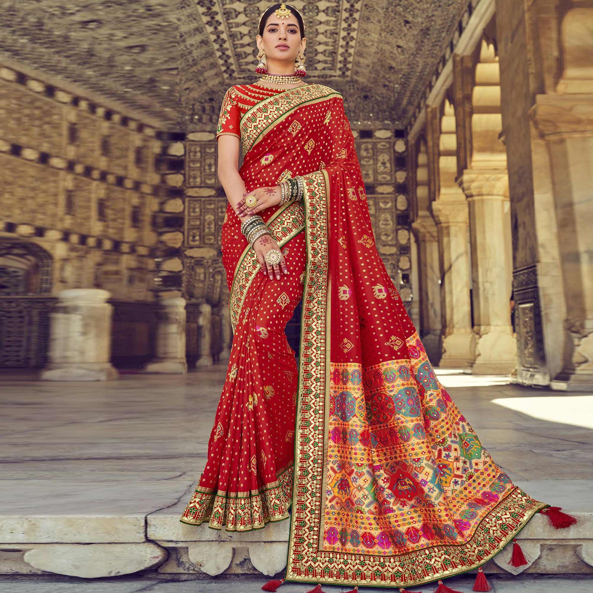 Red Wedding Wear Resham With Embellished Silk Patola Saree - Peachmode