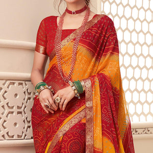 Red-Yellow Casual Wear Bandhani Printed Chiffon Saree With Tassels - Peachmode