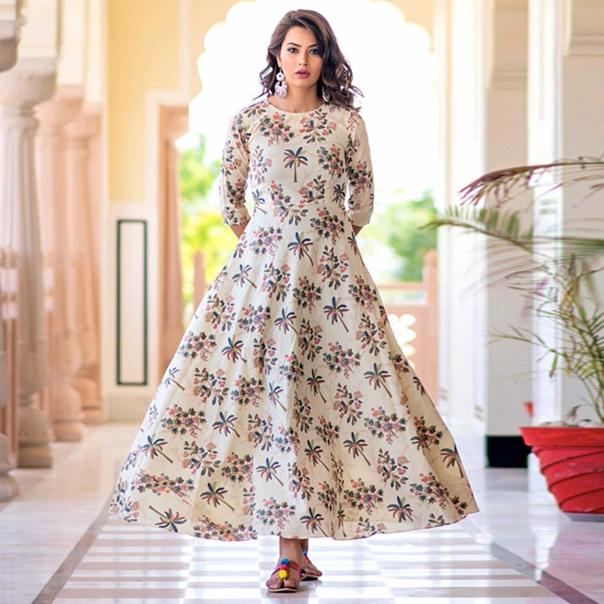 Refreshing Cream Colored Partywear Printed Muslin Blend Long Kurti - Peachmode