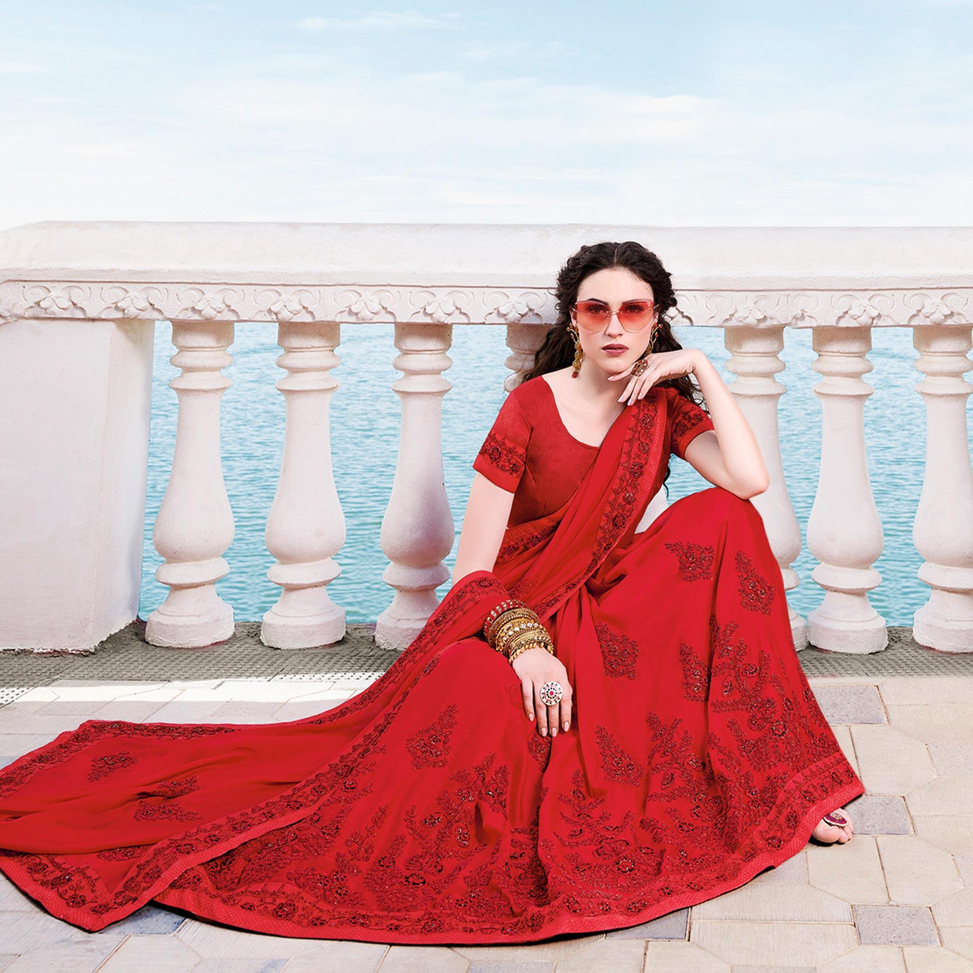 Refreshing Red Colored Partywear Embroidered Georgette Saree - Peachmode