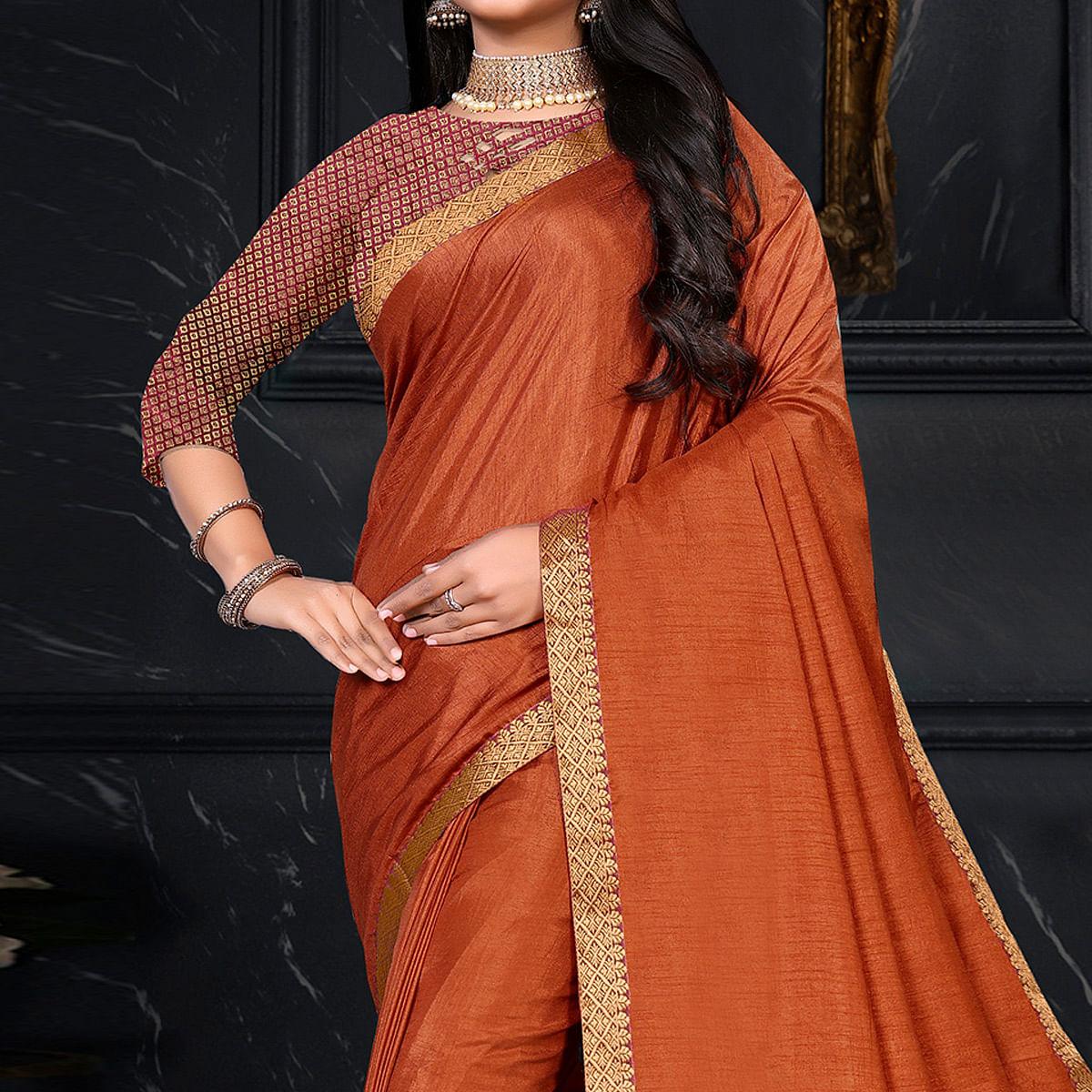 Rust Festive Wear Embellished Vichitra Silk Saree - Peachmode