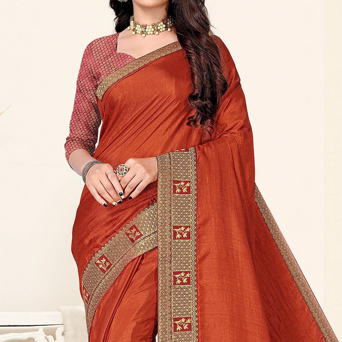 Rust Festive Wear Solid Art Silk Saree - Peachmode