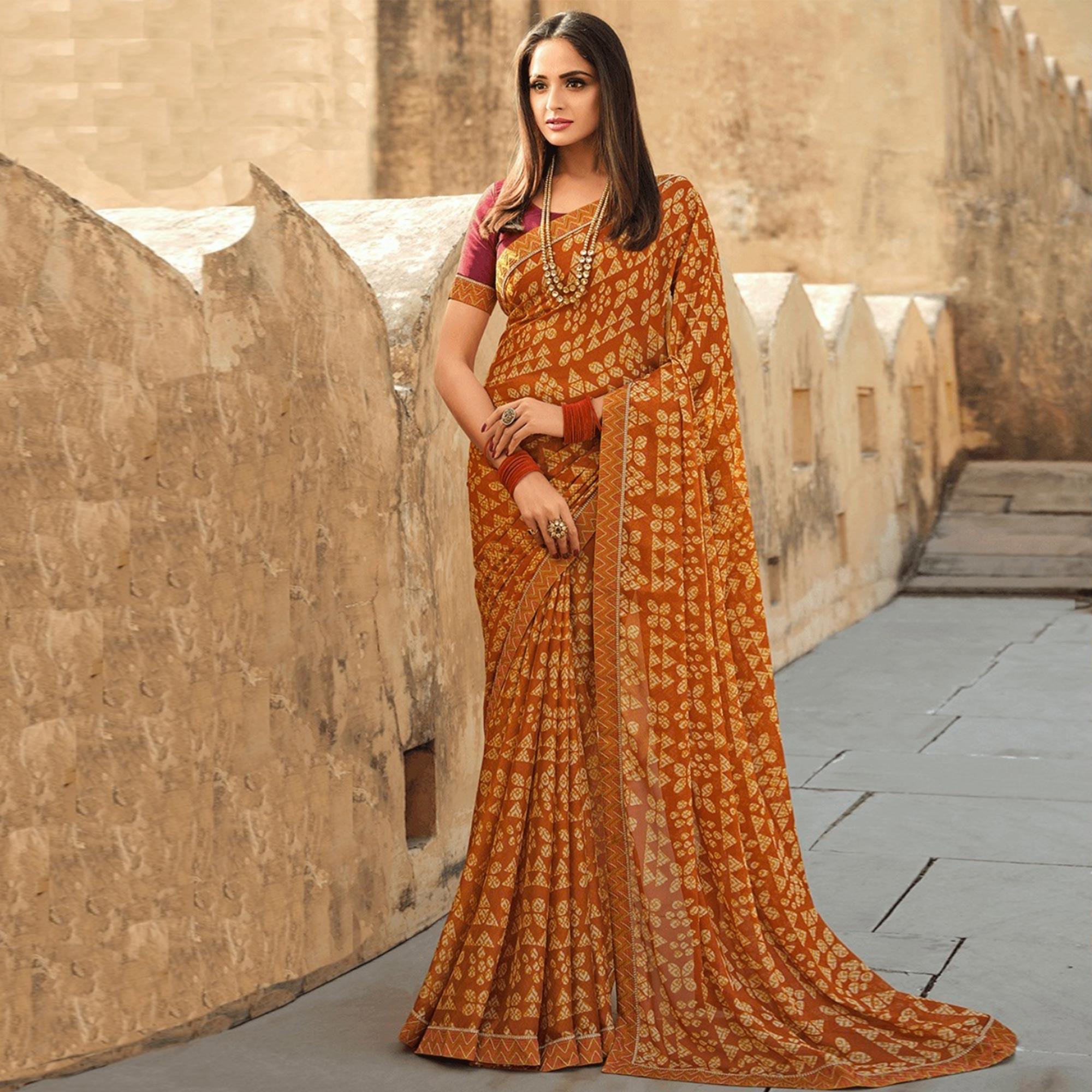 Rust Printed Georgette Saree - Peachmode