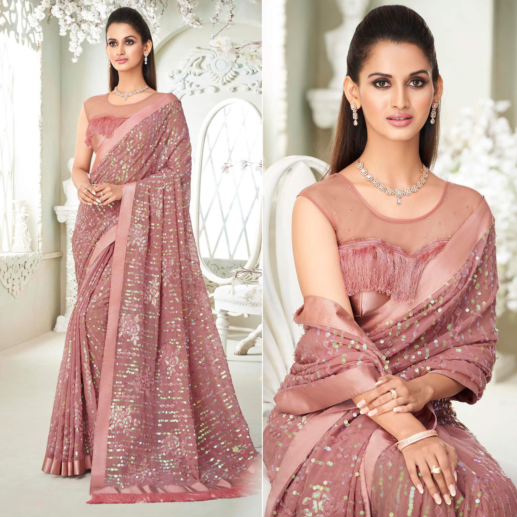 Salmon Pink Sequence Embroidered Georgette Saree With Tassels - Peachmode
