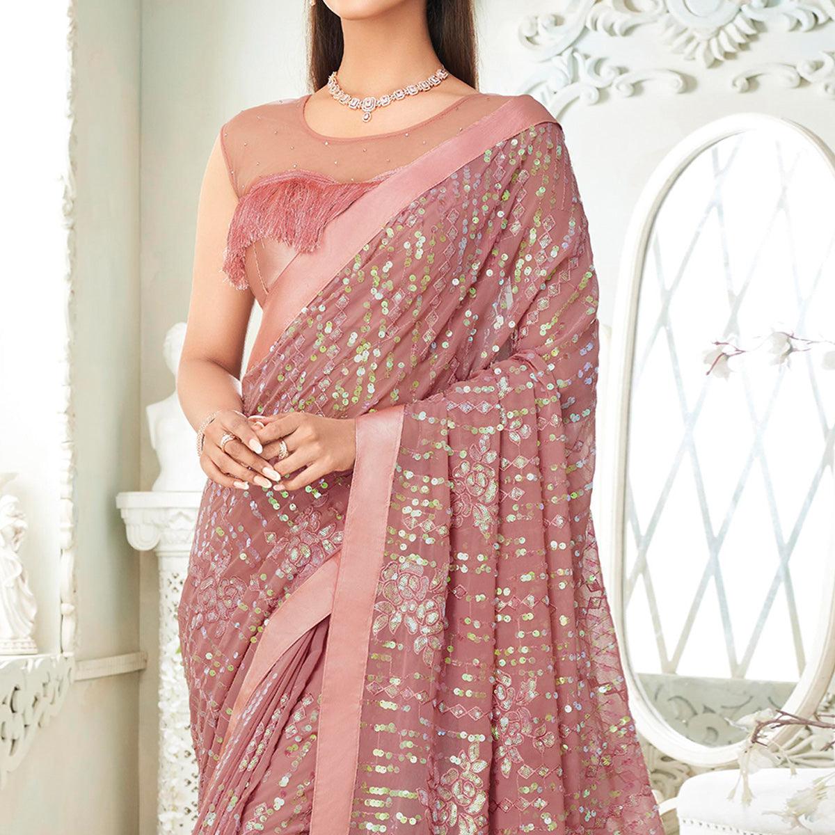 Salmon Pink Sequence Embroidered Georgette Saree With Tassels - Peachmode