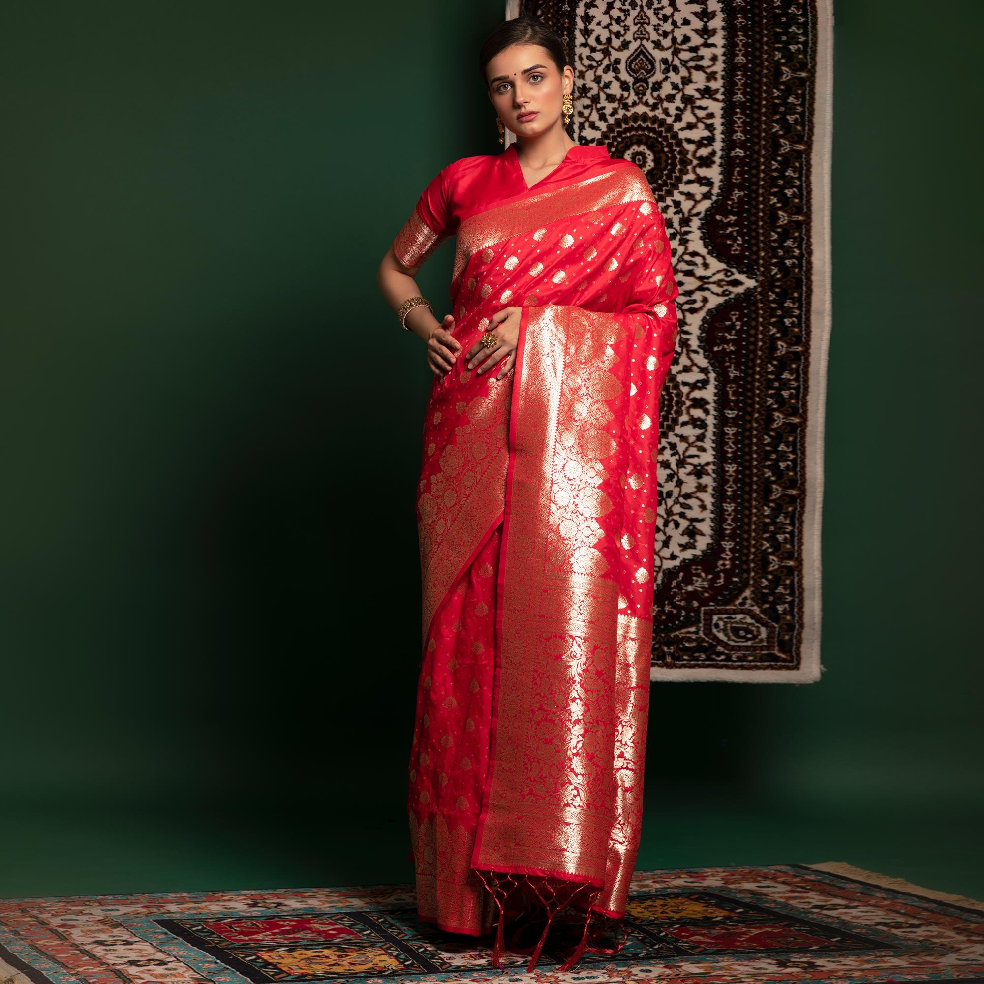 Salmon Pink Woven Art Silk Saree With Tassels - Peachmode