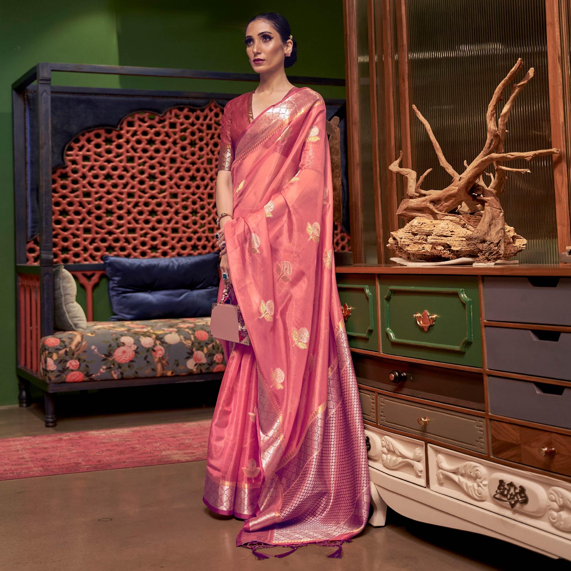 Salmon Pink Woven Organza Saree With Tassels - Peachmode