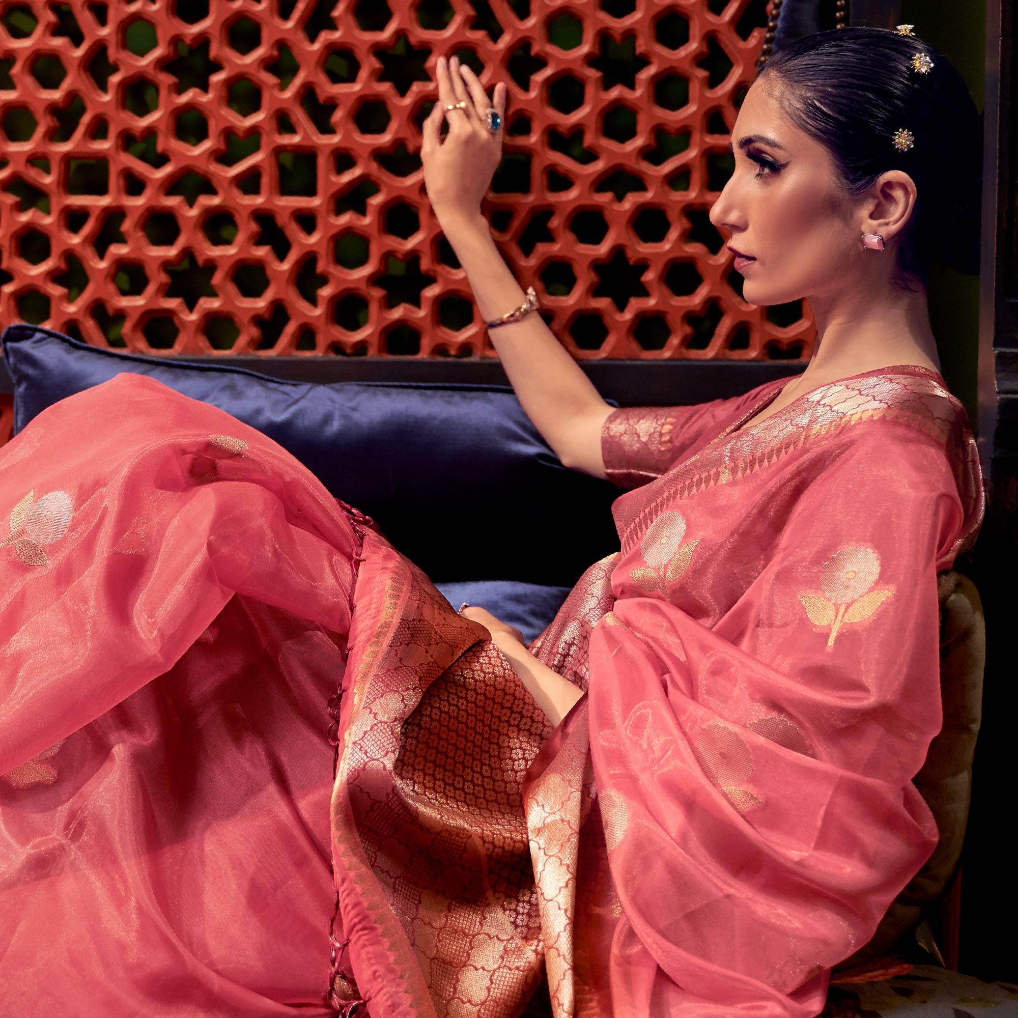Salmon Pink Woven Organza Saree With Tassels - Peachmode