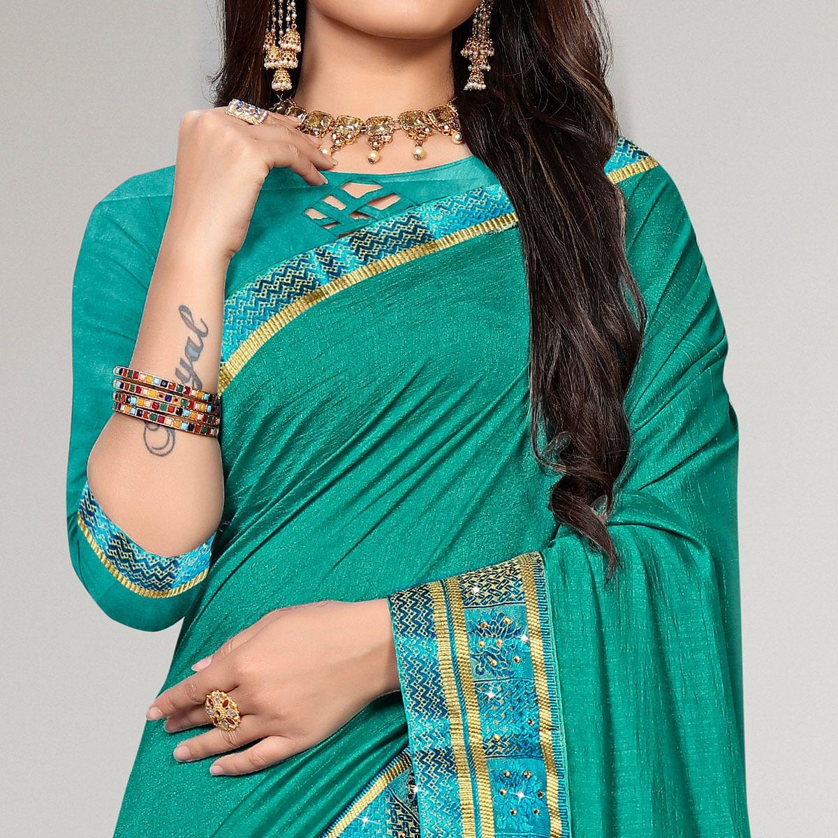 Sea Green Casual Wear Solid Vichitra Silk Saree - Peachmode