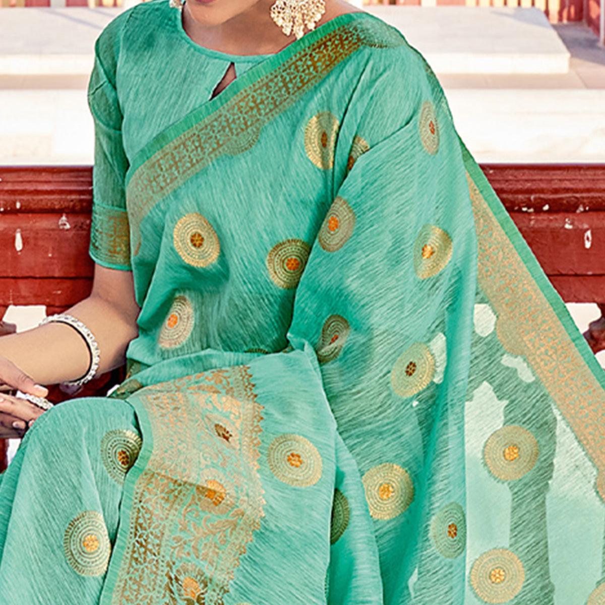 Sea Green Festive Wear Weaving Work Linen Saree With Tassels - Peachmode