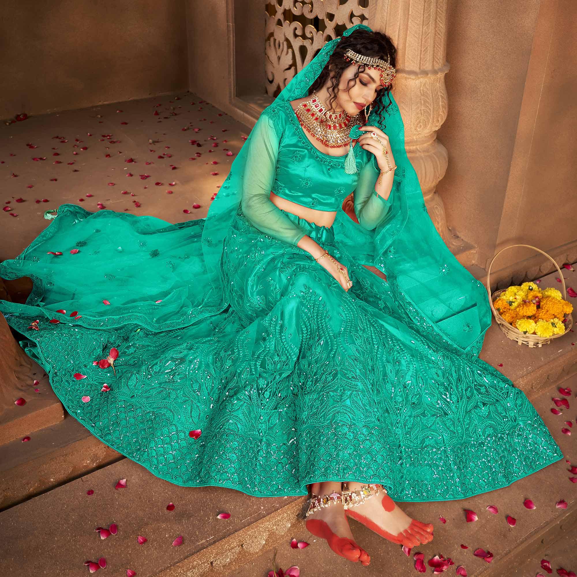 Sea Green Partywear Multi Sequence Embroidered Net Lehenga Choli - Peachmode