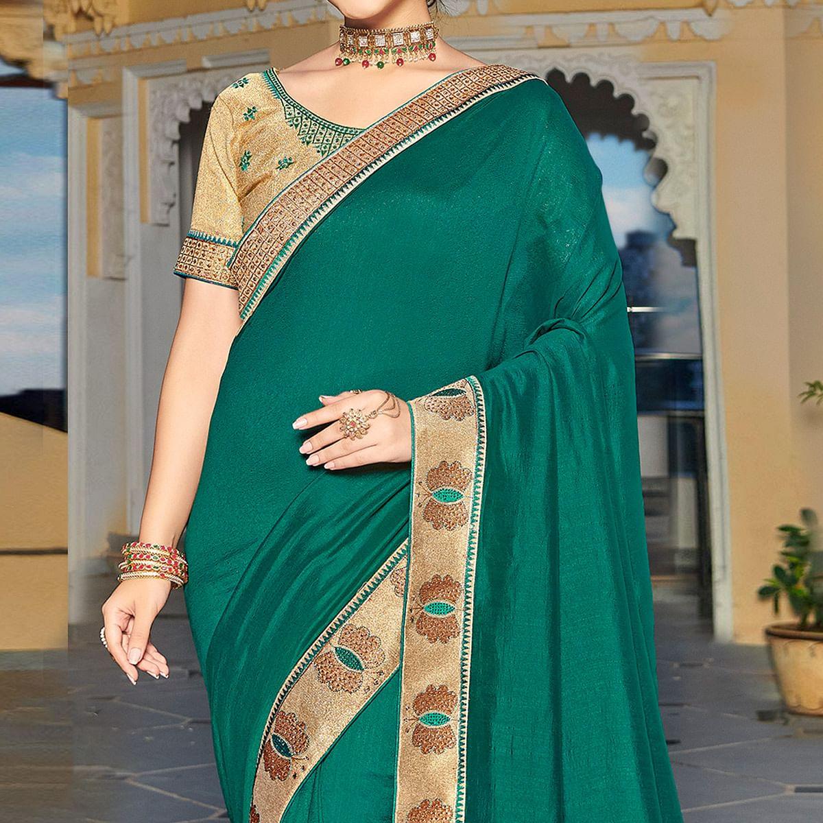 Sea Green Solid-Embroidered Border Vichitra Silk Saree With Tassels - Peachmode