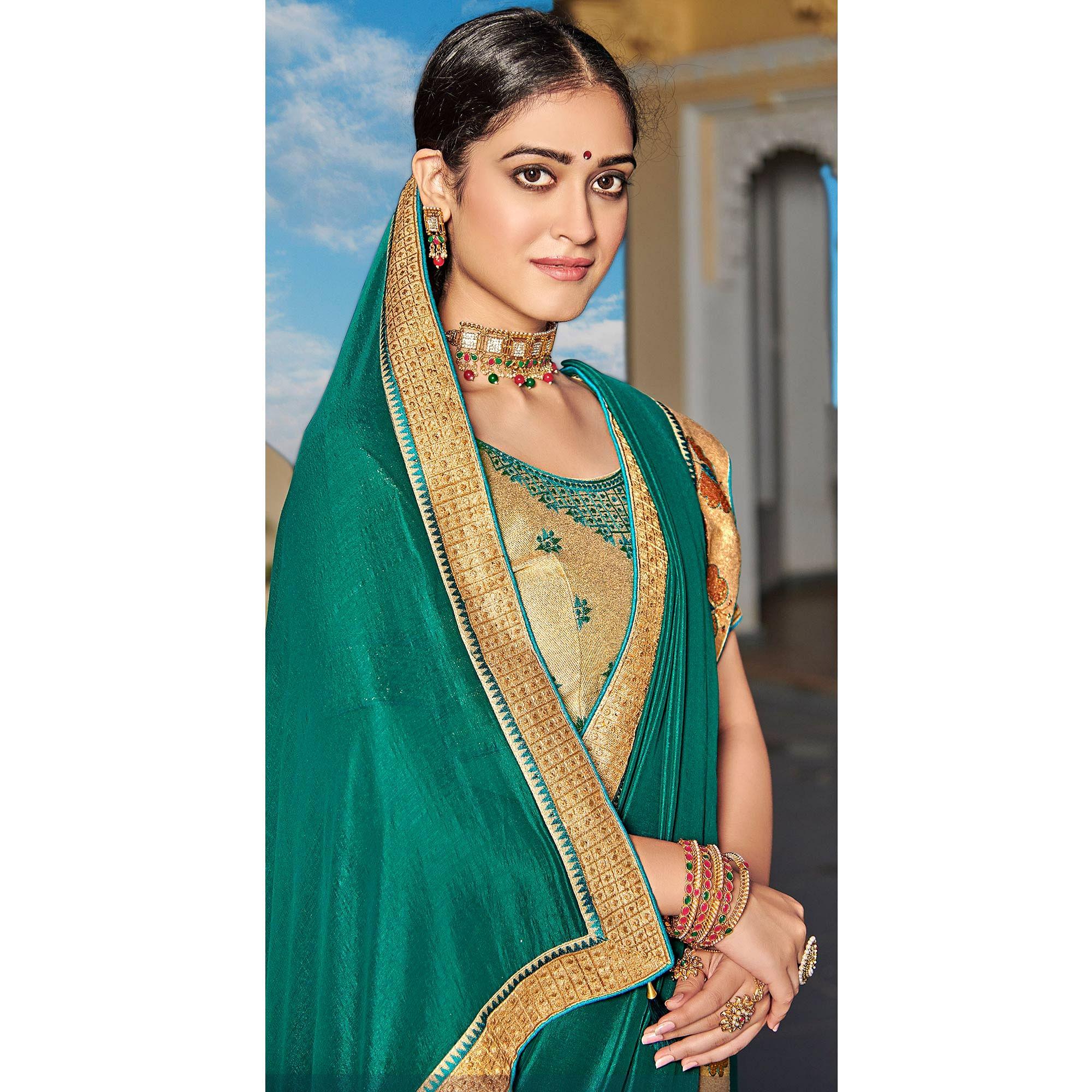 Sea Green Solid-Embroidered Border Vichitra Silk Saree With Tassels - Peachmode