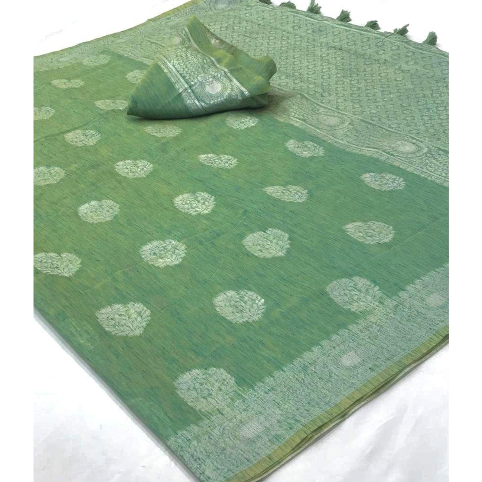 Sea Green Woven Linen Saree With Tassels - Peachmode