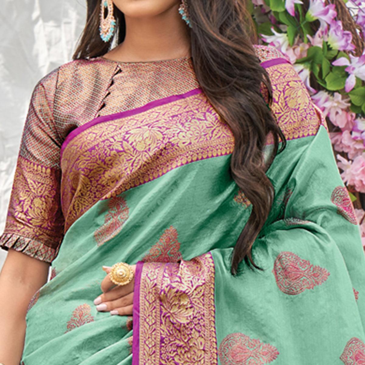 Sea Green Woven Organza Saree with Tassels - Peachmode
