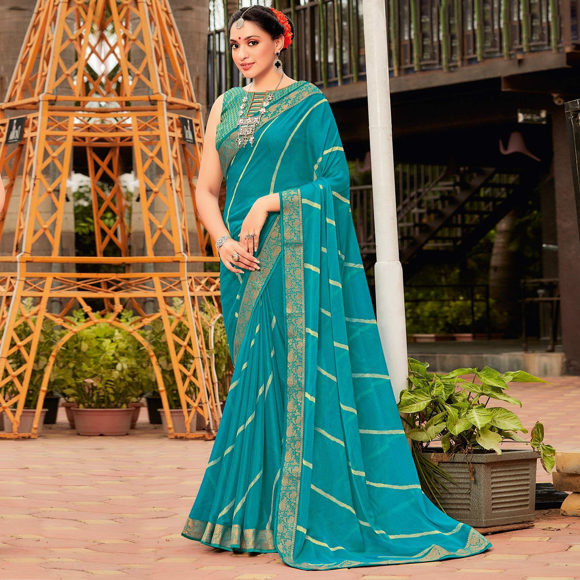 Sky Blue Partywear Printed Chiffon Saree With Border - Peachmode