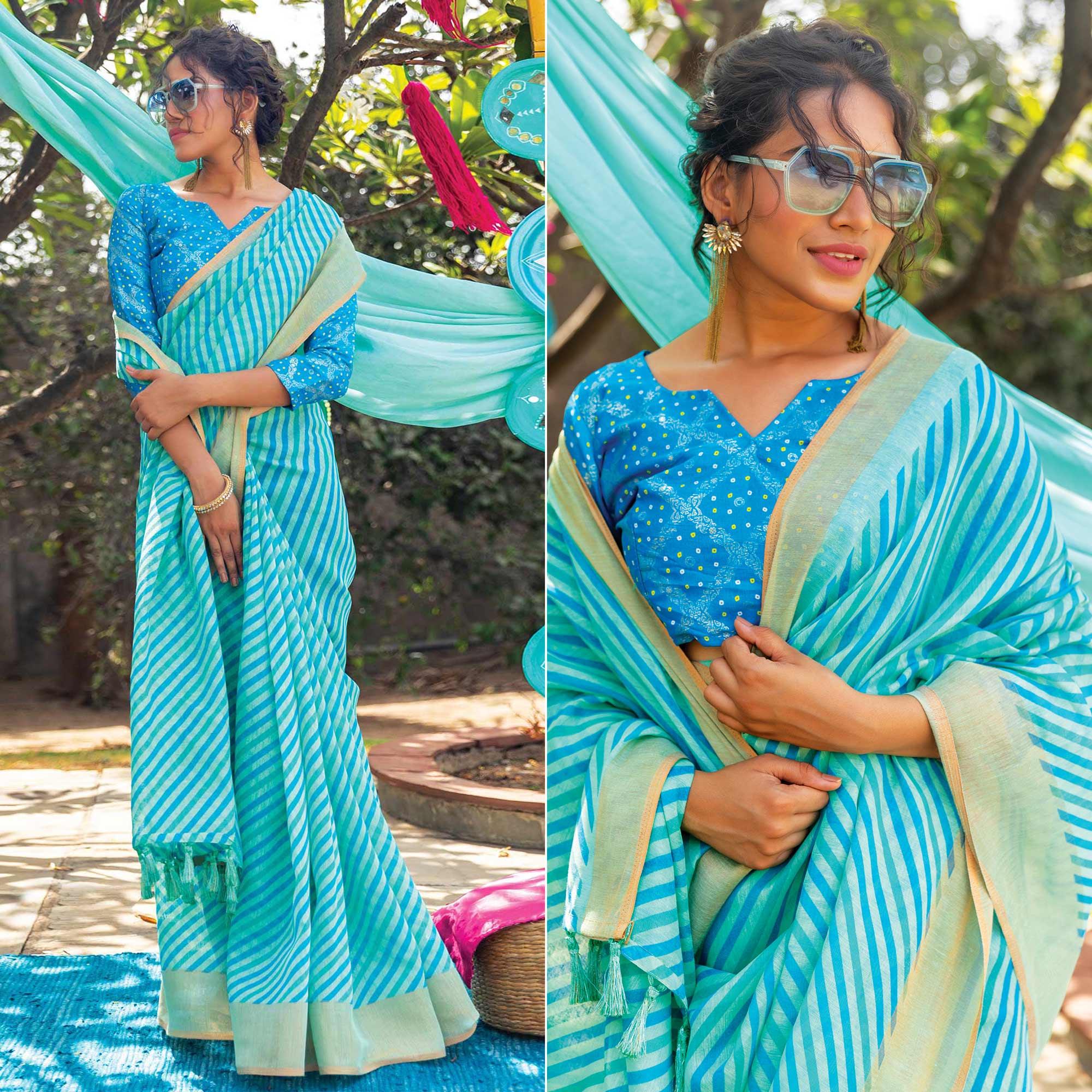 Sky Blue Striped Printed Cotton Saree With Tassels - Peachmode