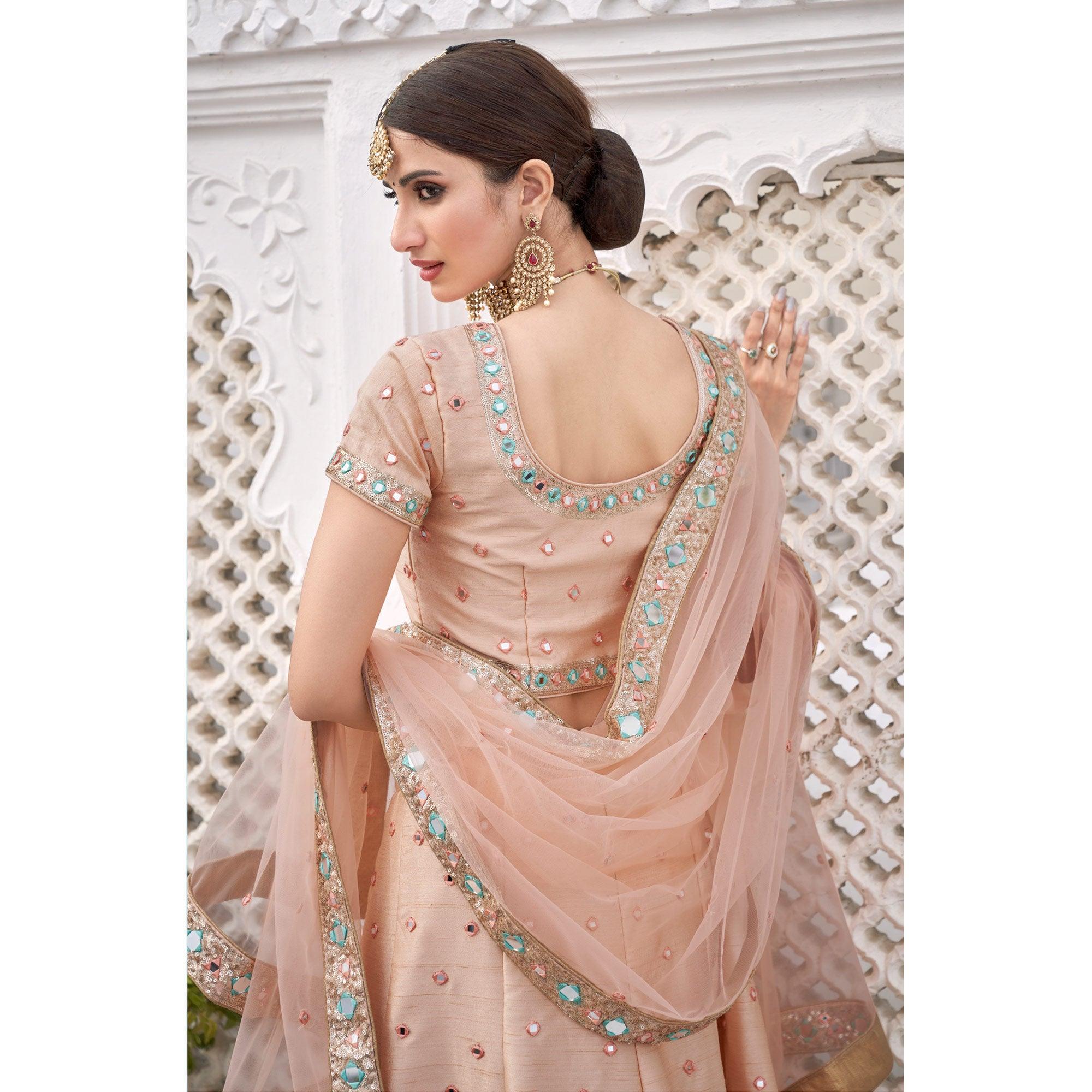 Sophisticated Peach Coloured Wedding Wear Mirror Work Heavy Silk Lehenga Choli - Peachmode