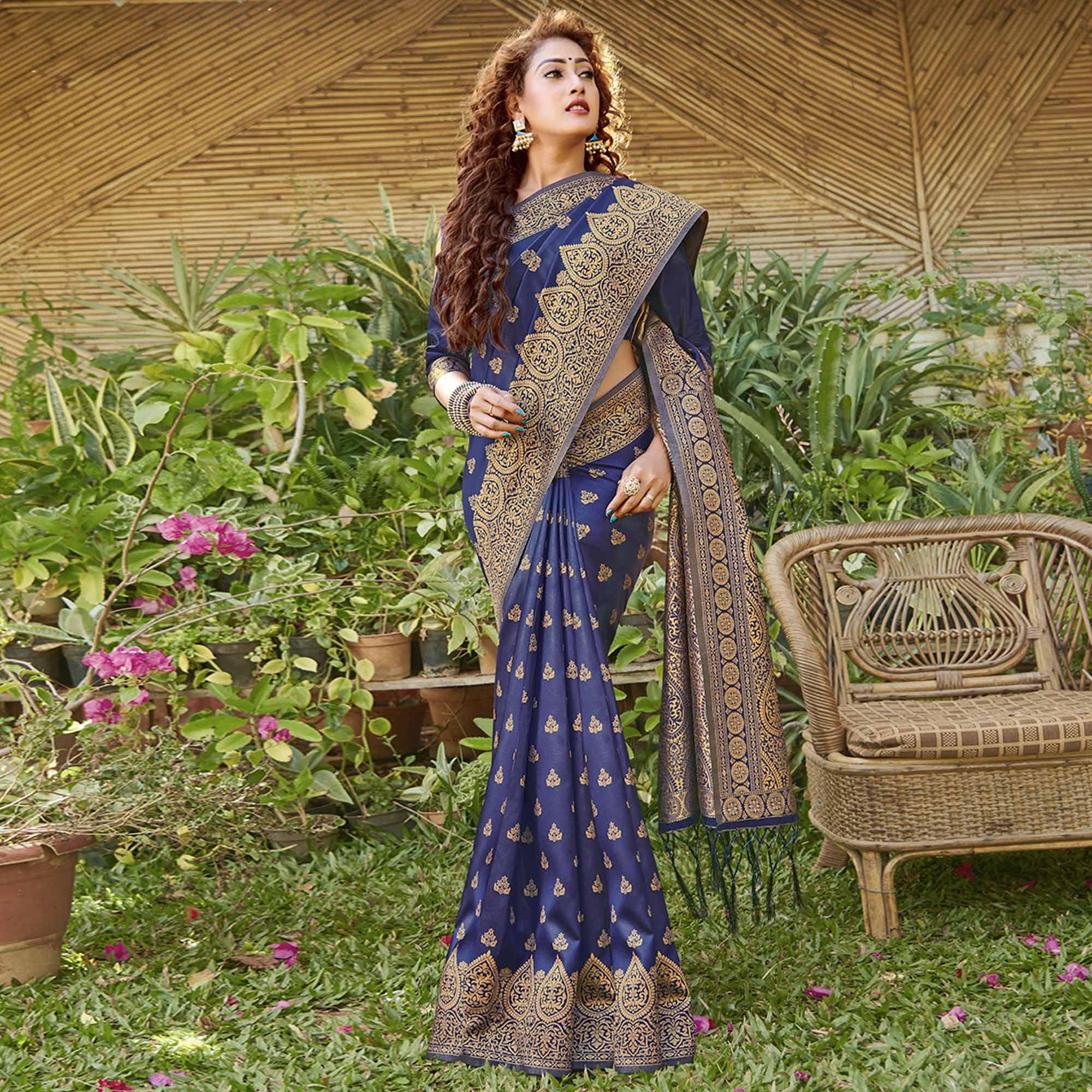 Staring Navy Blue Colored Festive Wear Geomatric Woven Silk Blend Saree With Tassels - Peachmode