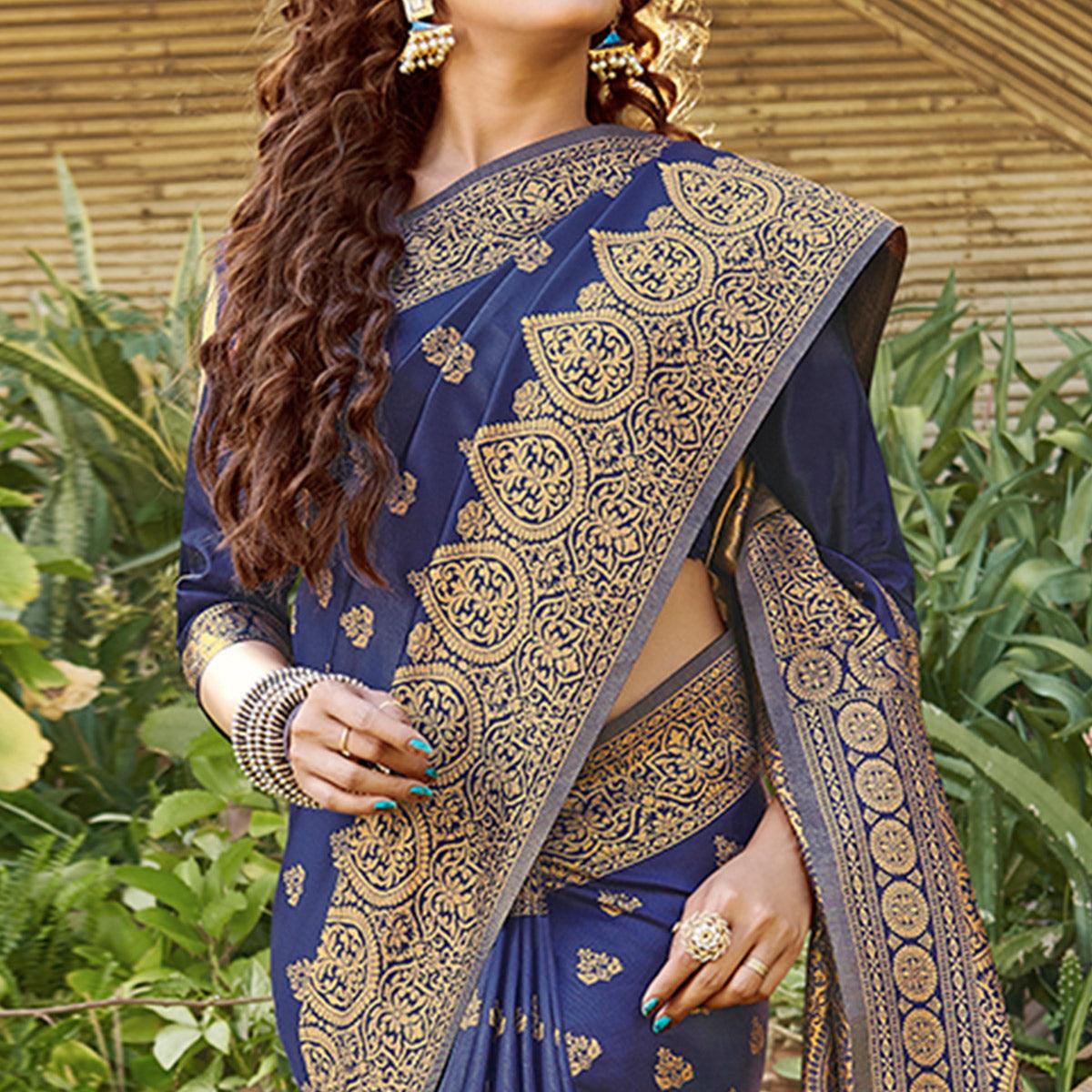 Staring Navy Blue Colored Festive Wear Geomatric Woven Silk Blend Saree With Tassels - Peachmode