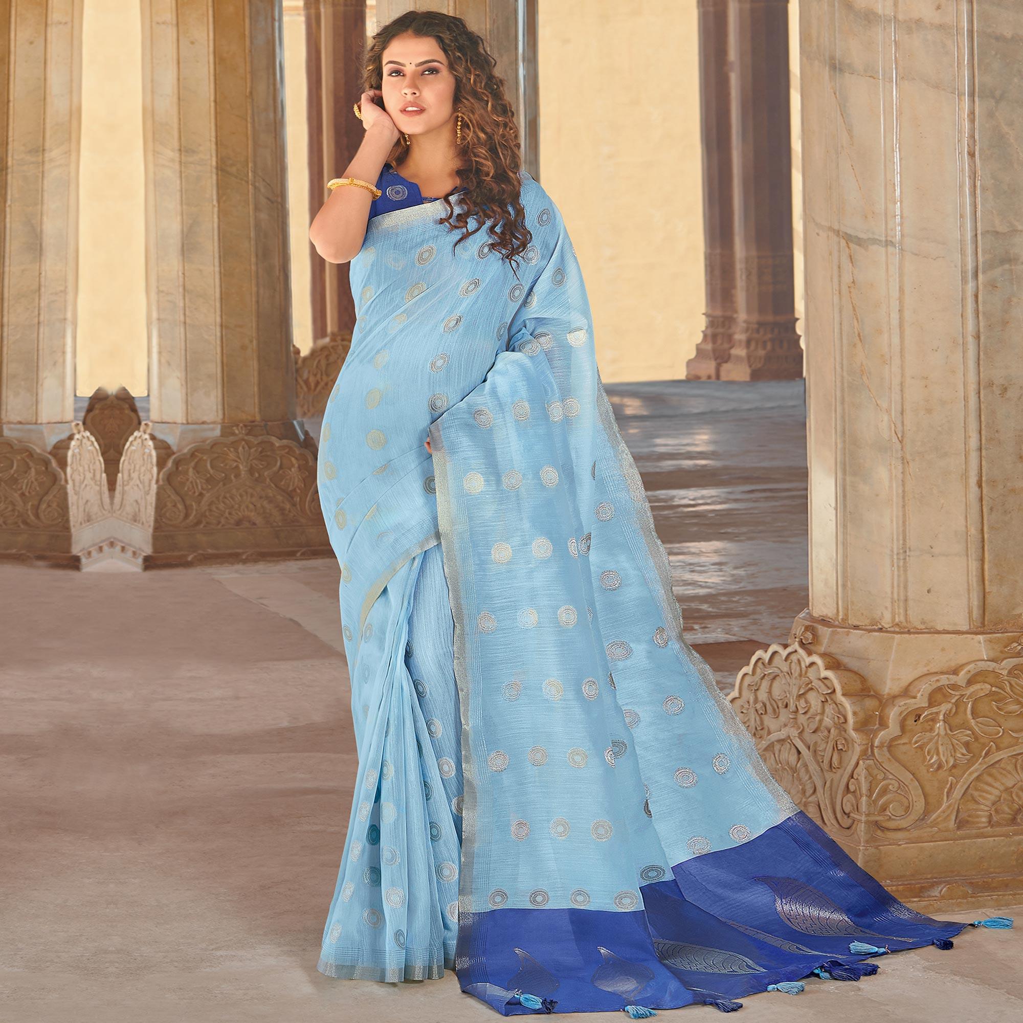 Staring Sky Blue Colored Festive Wear Woven Linen Cotton Saree With Tassels - Peachmode