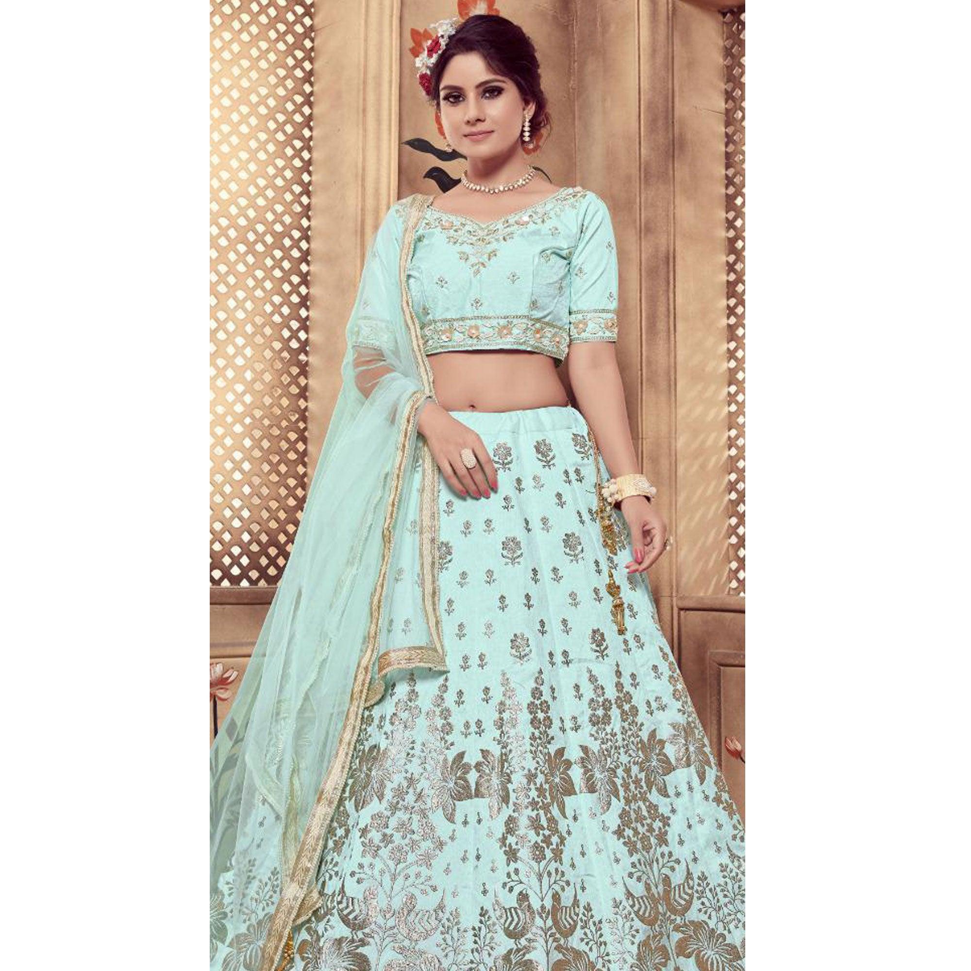 Staring Turquoise Blue Colored Party Wear Embroidered Silk Lehenga Choli - Peachmode