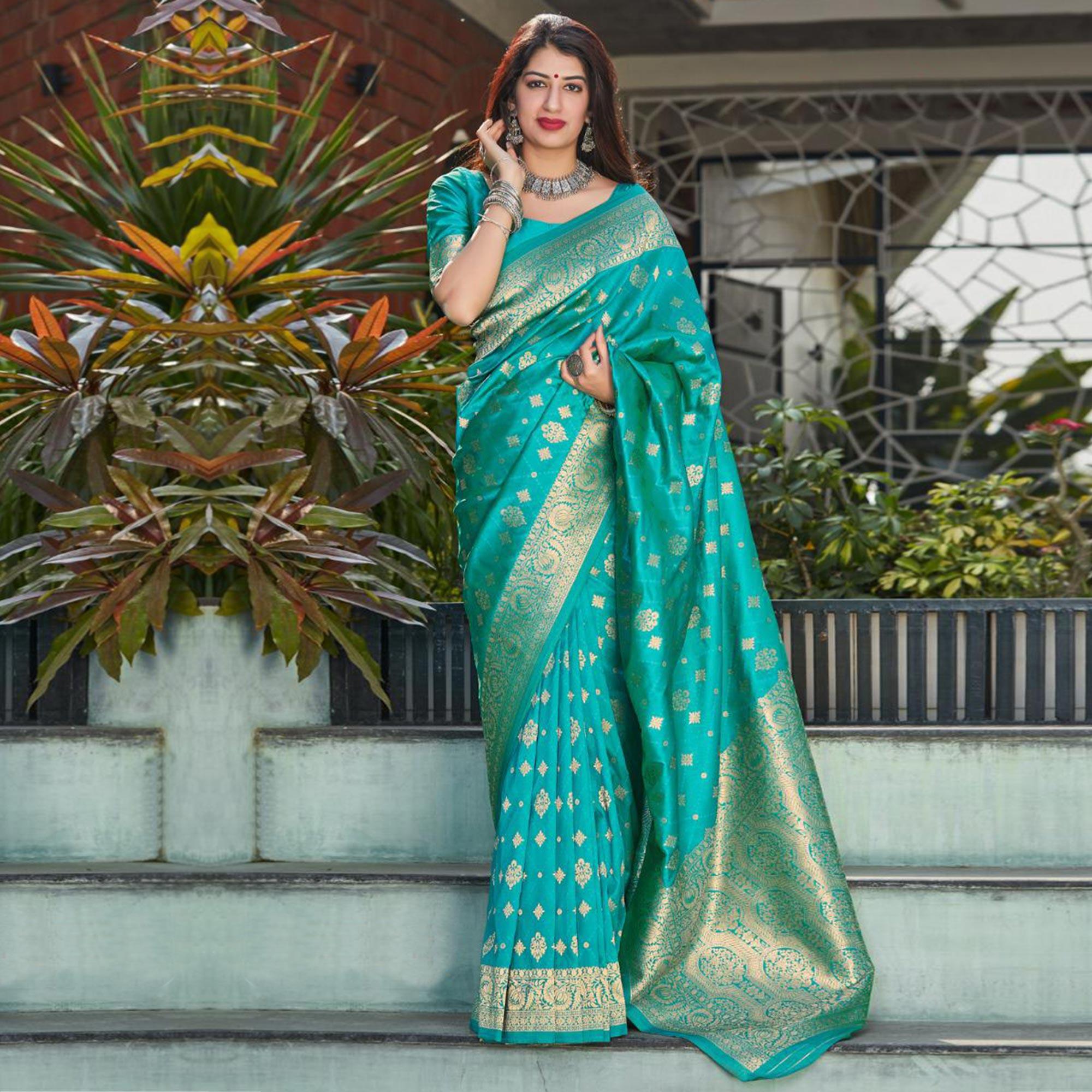 Staring Turquoise Coloured Partywear Woven Silk Saree - Peachmode