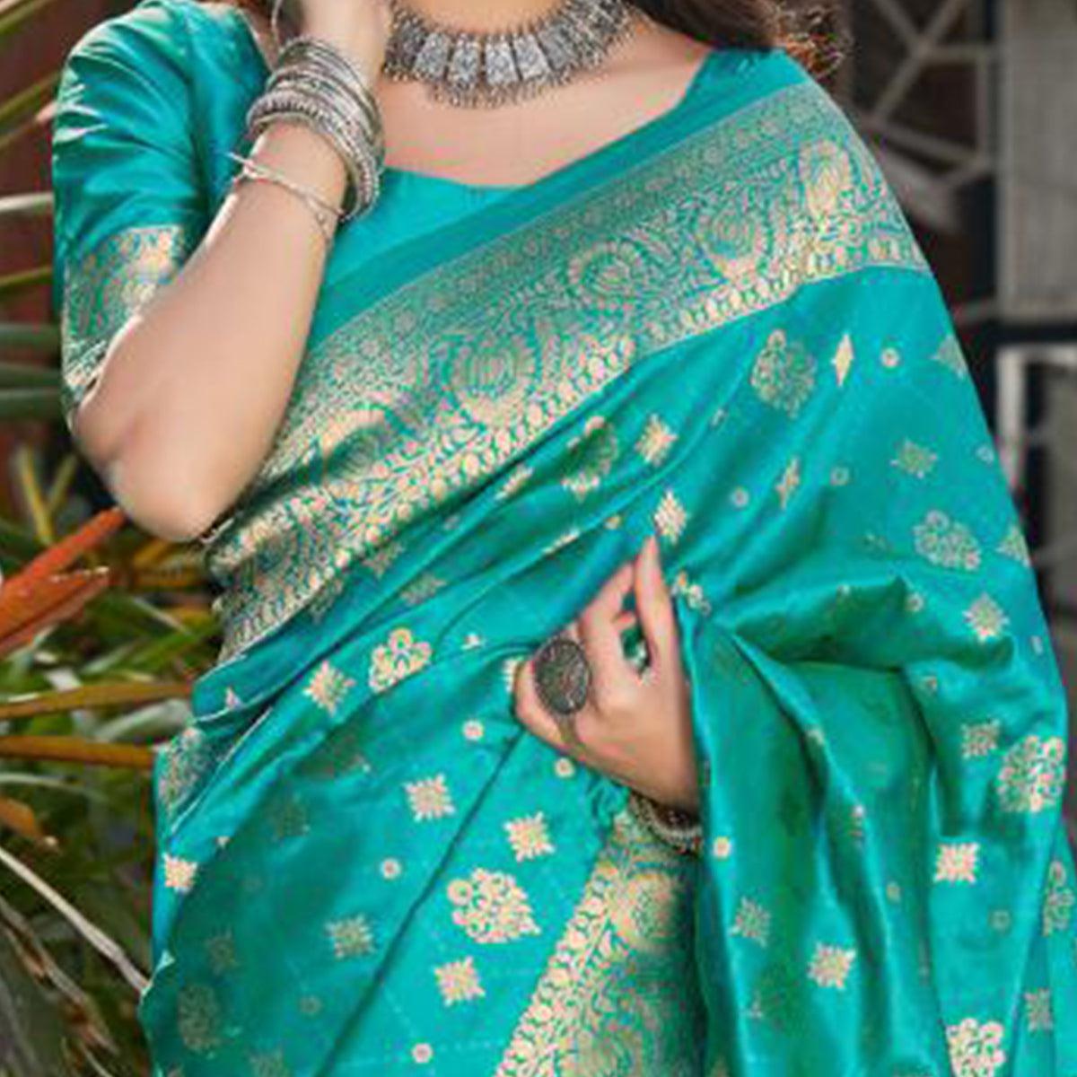 Staring Turquoise Coloured Partywear Woven Silk Saree - Peachmode