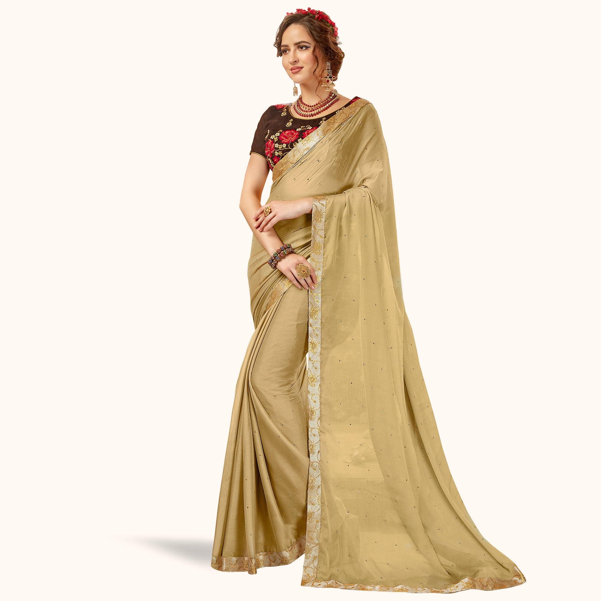 Stunning Chiku Colored Partywear Georgette Saree - Peachmode