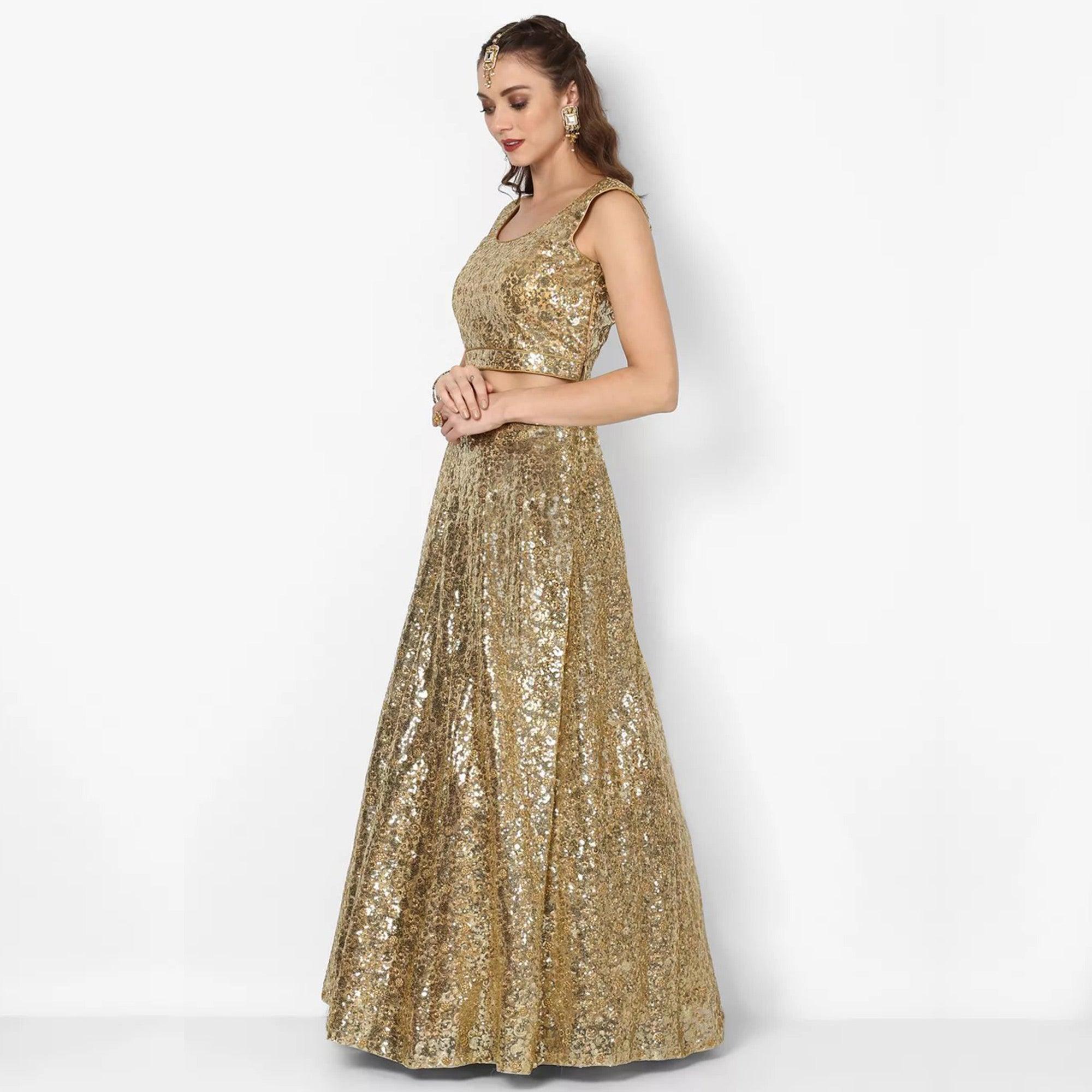 Stunning Golden Colored Partywear Embroidered Netted Lehenga Choli - Peachmode