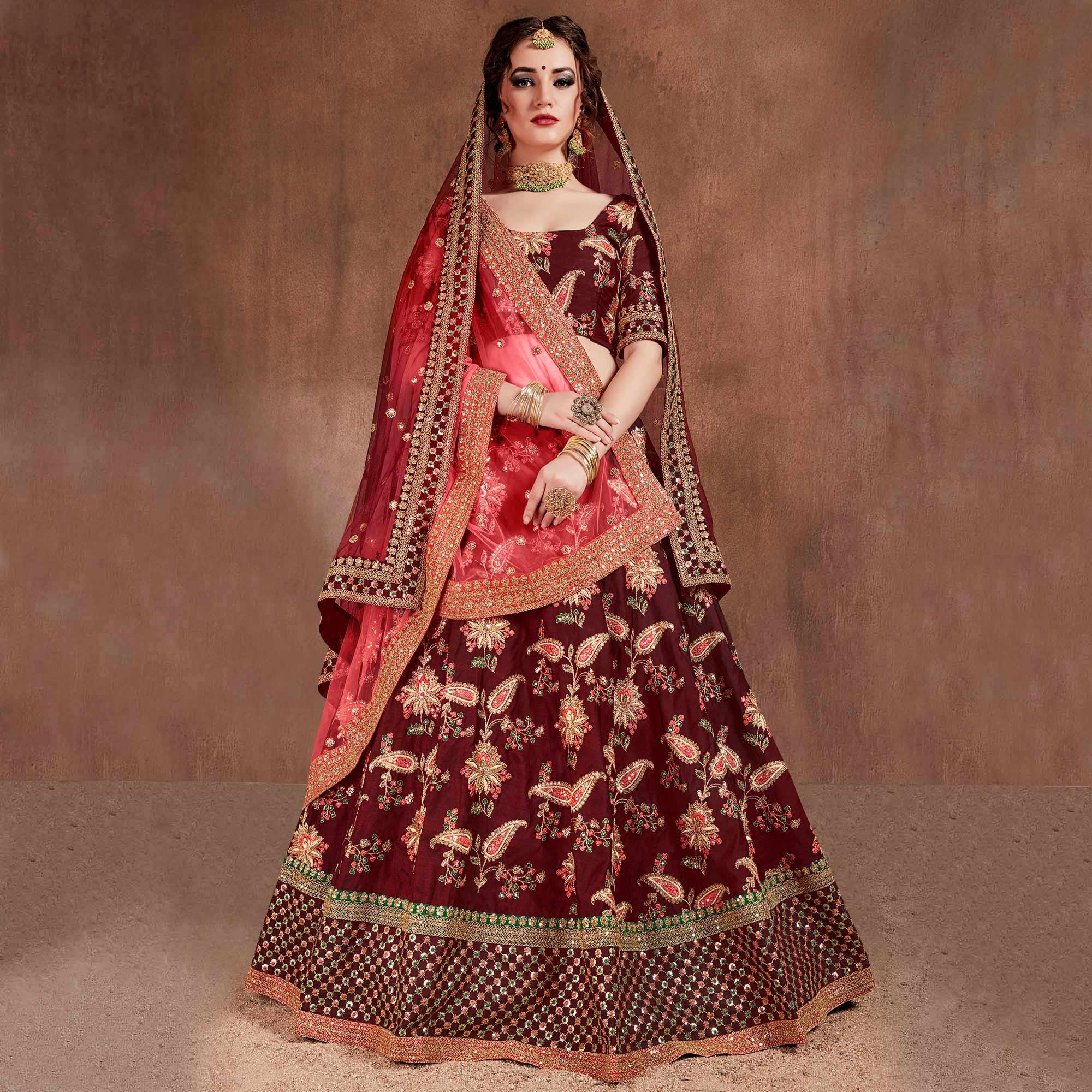 Stunning Maroon Colored Partywear Embroidered Tapeta Silk Lehenga Choli - Peachmode