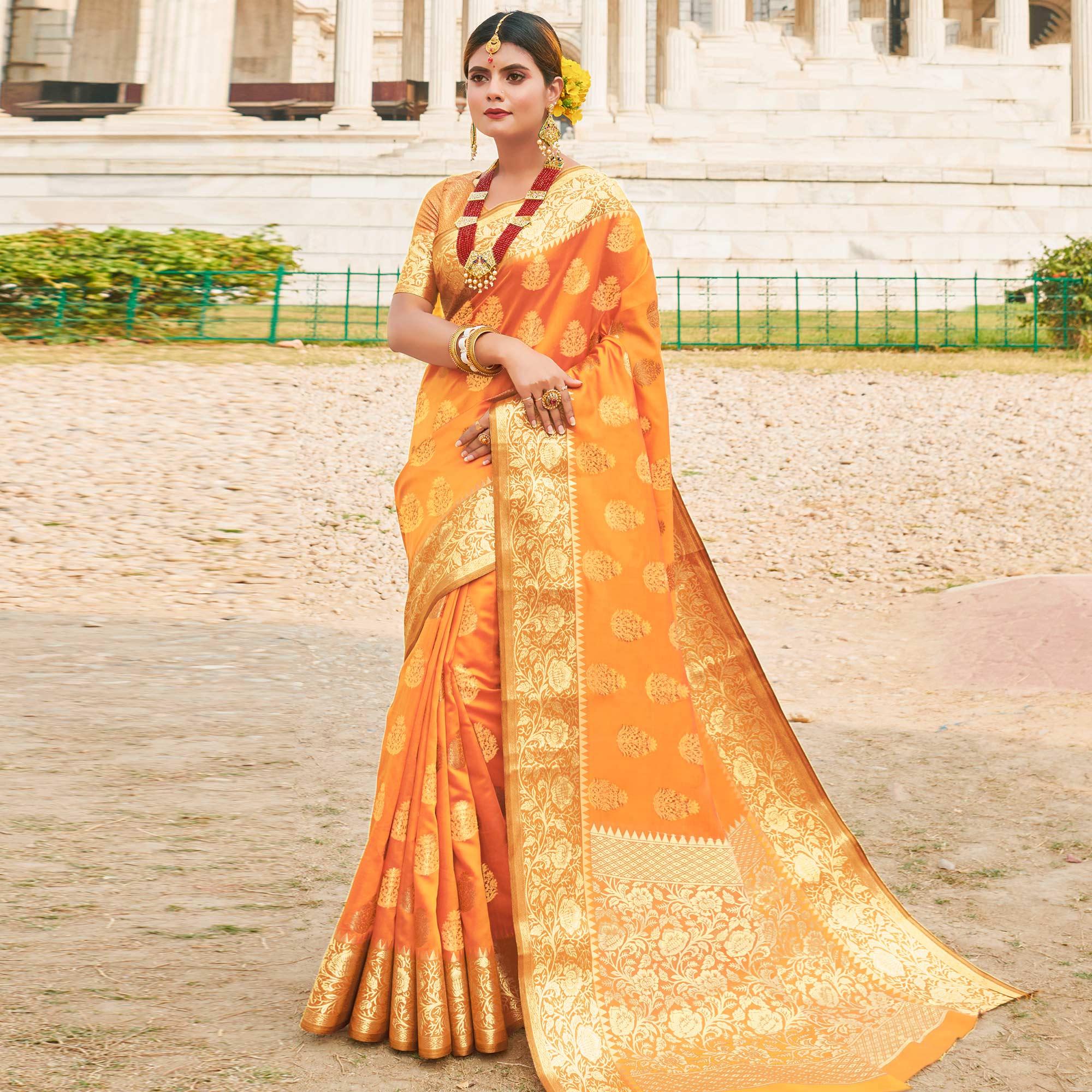 Stunning Orange Colored Festive Wear Woven Silk Sareee - Peachmode