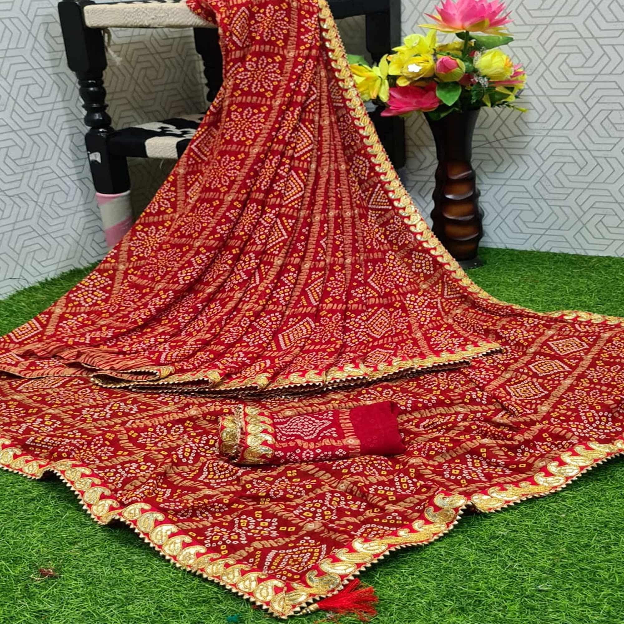 Stunning Red Colored Casual Printed Moss Georgette Saree - Peachmode