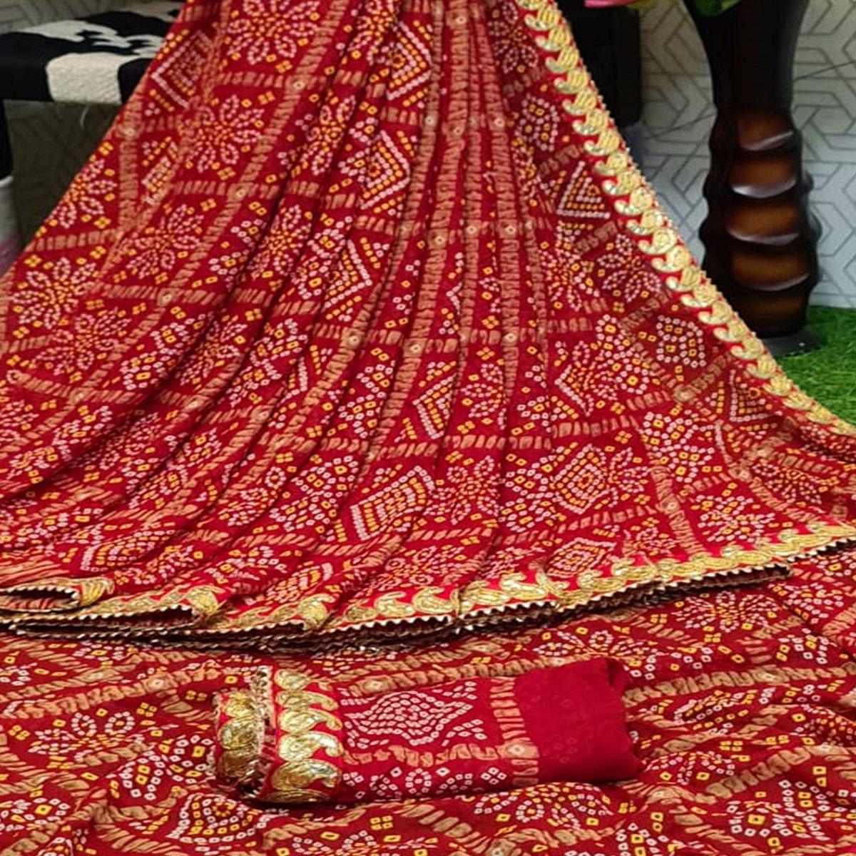 Stunning Red Colored Casual Printed Moss Georgette Saree - Peachmode