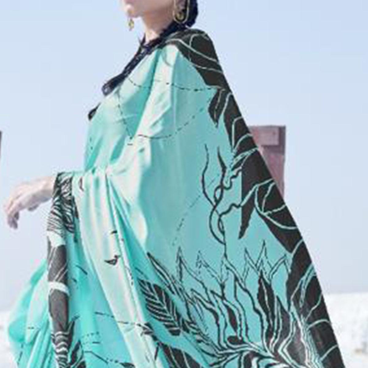 Surpassing Aqua Blue Colored Casual Wear Printed Satin Crepe Saree - Peachmode