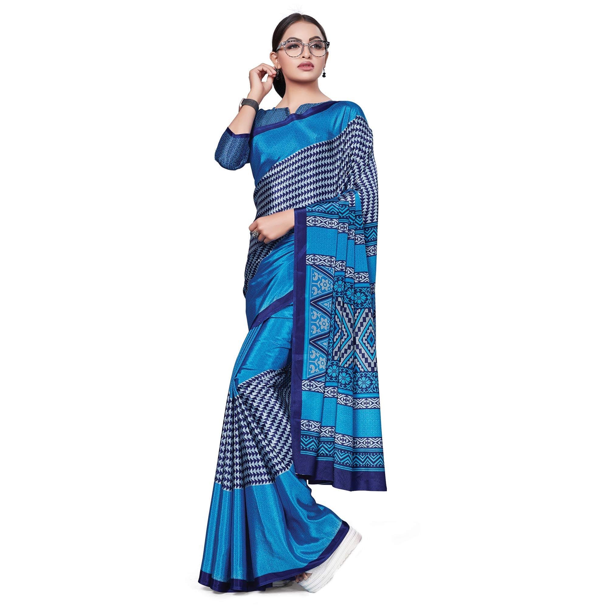 Surpassing Blue Colored Casual Wear Printed Crepe Saree - Peachmode
