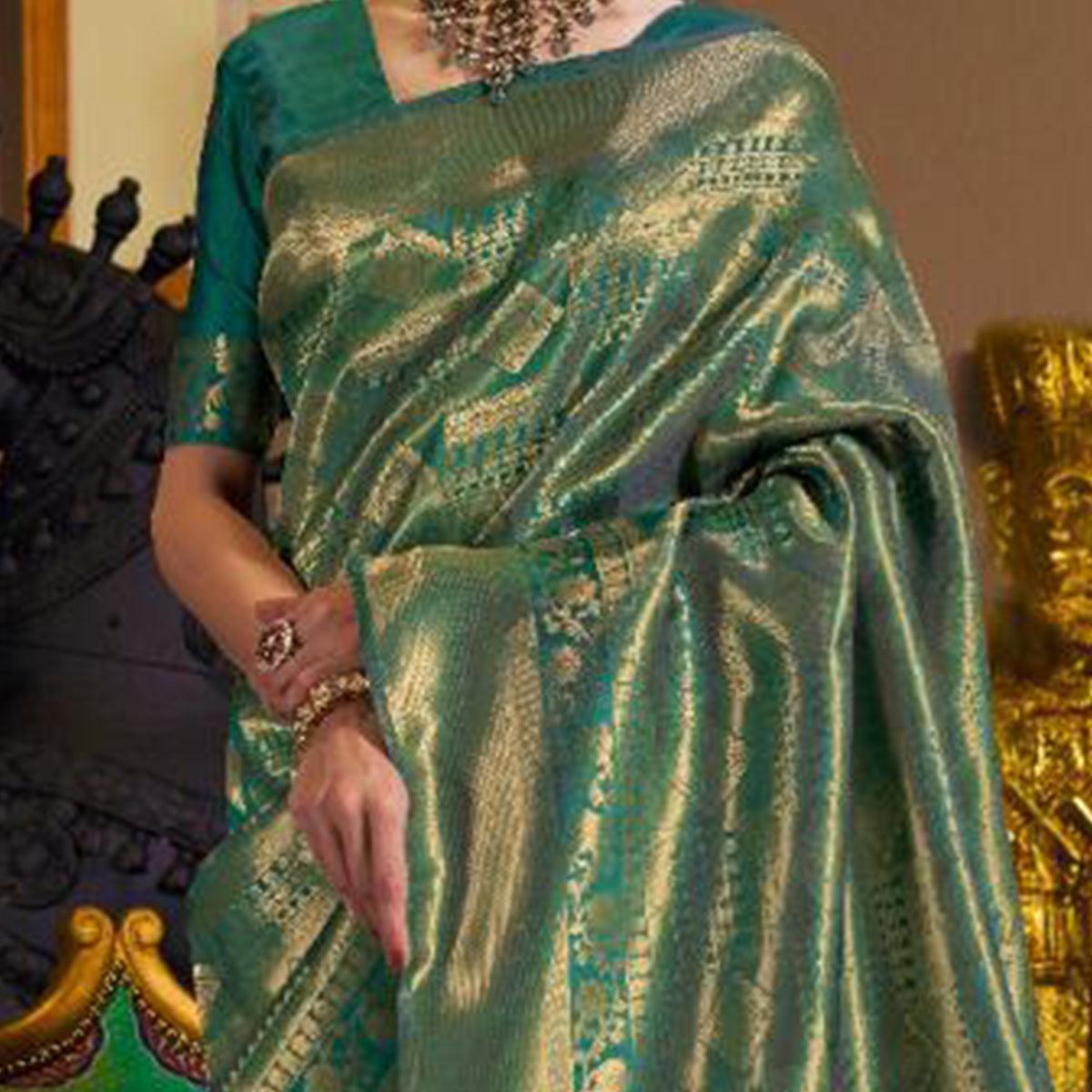 Surpassing Green Colored Festive Wear Woven Silk Saree With Tassels - Peachmode