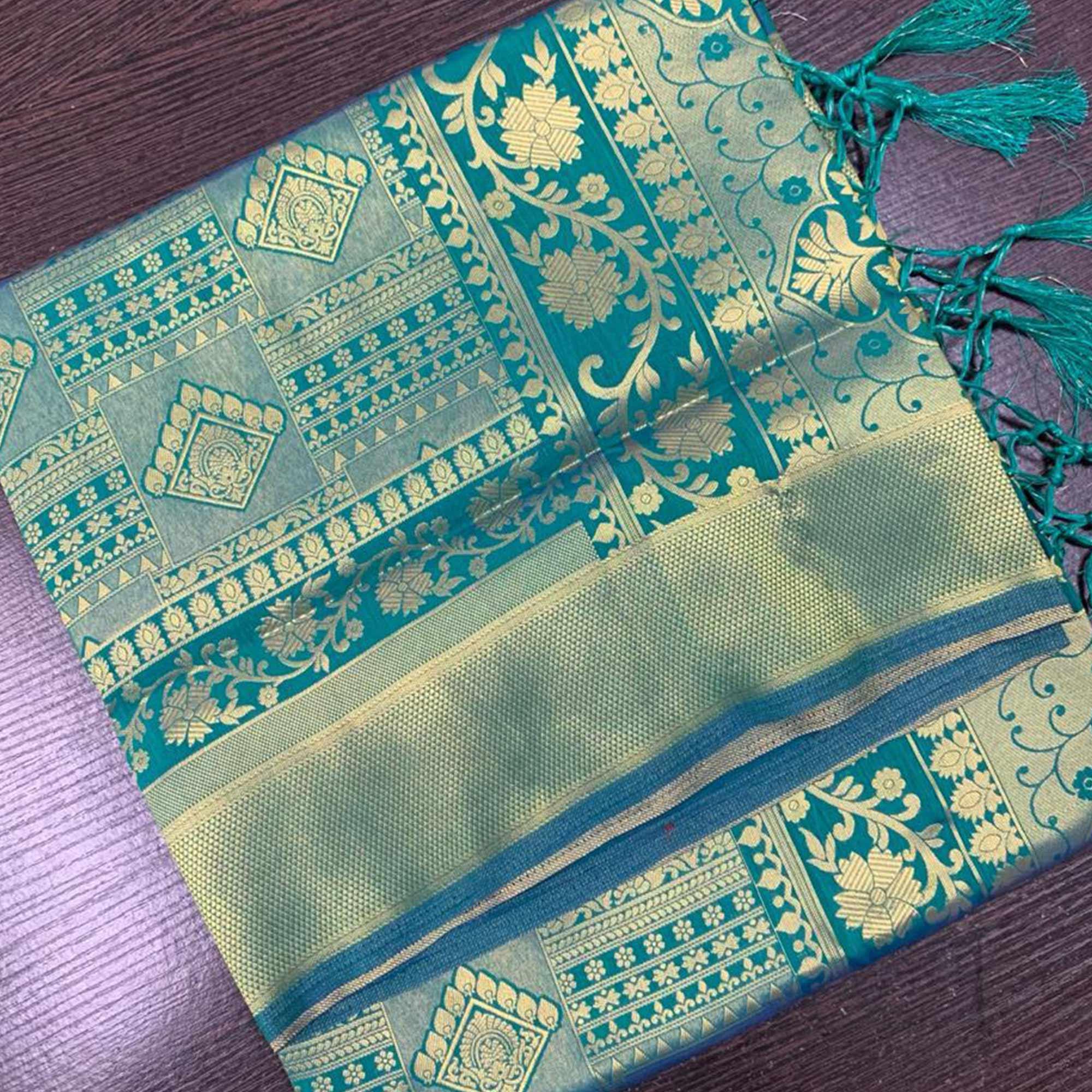 Surpassing Green Colored Festive Wear Woven Silk Saree With Tassels - Peachmode