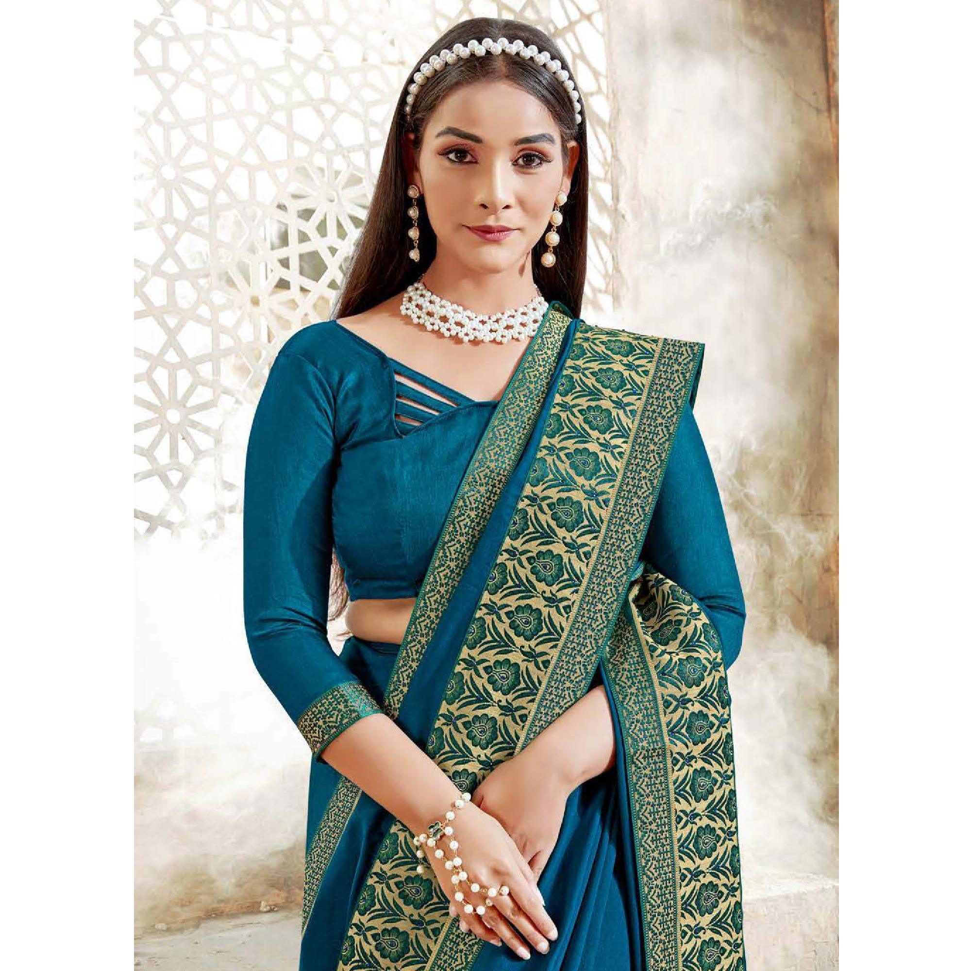 Teal Blue Casual Wear Solid Silk Saree With Fancy Border - Peachmode