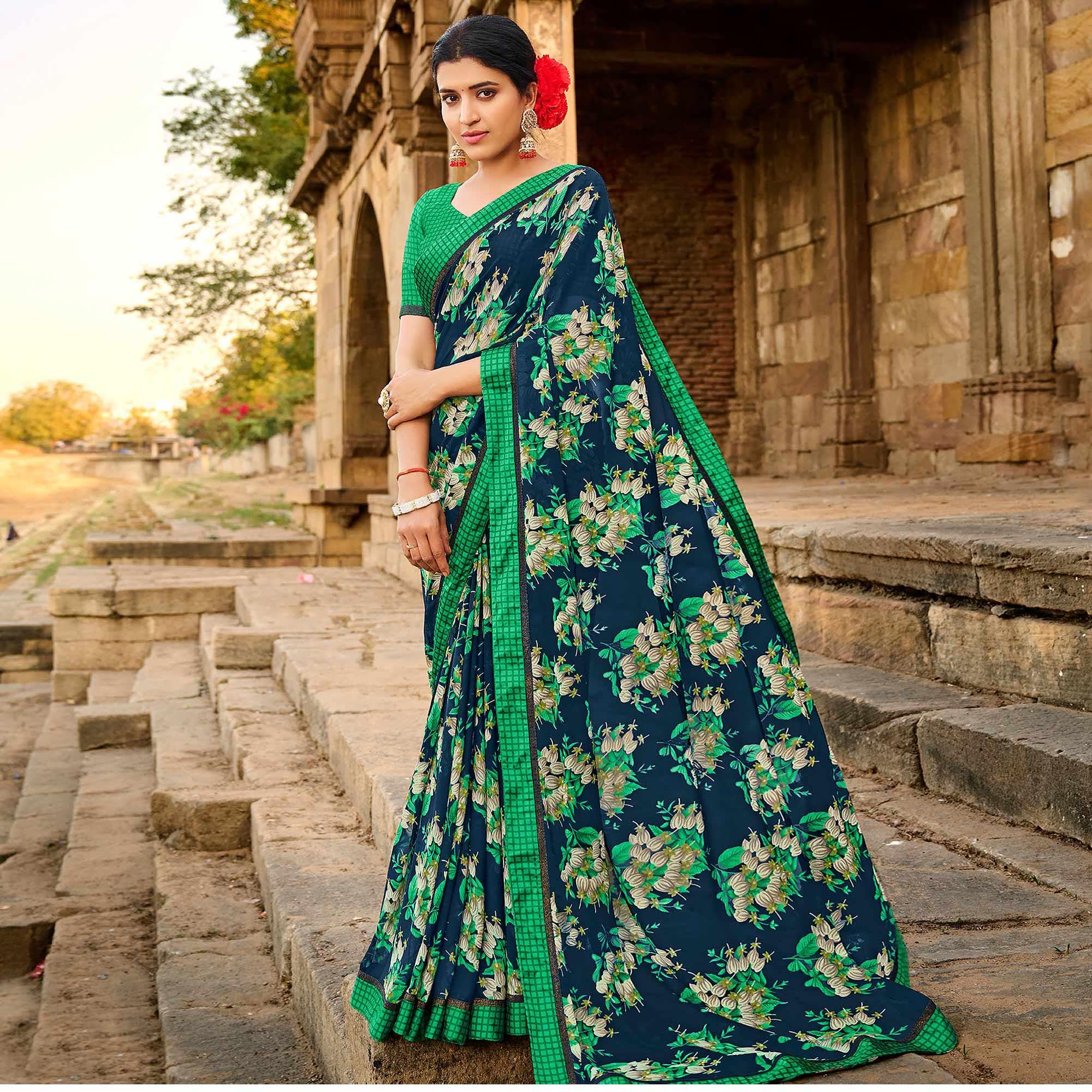 Teal Blue Foil Printed Georgette Saree - Peachmode