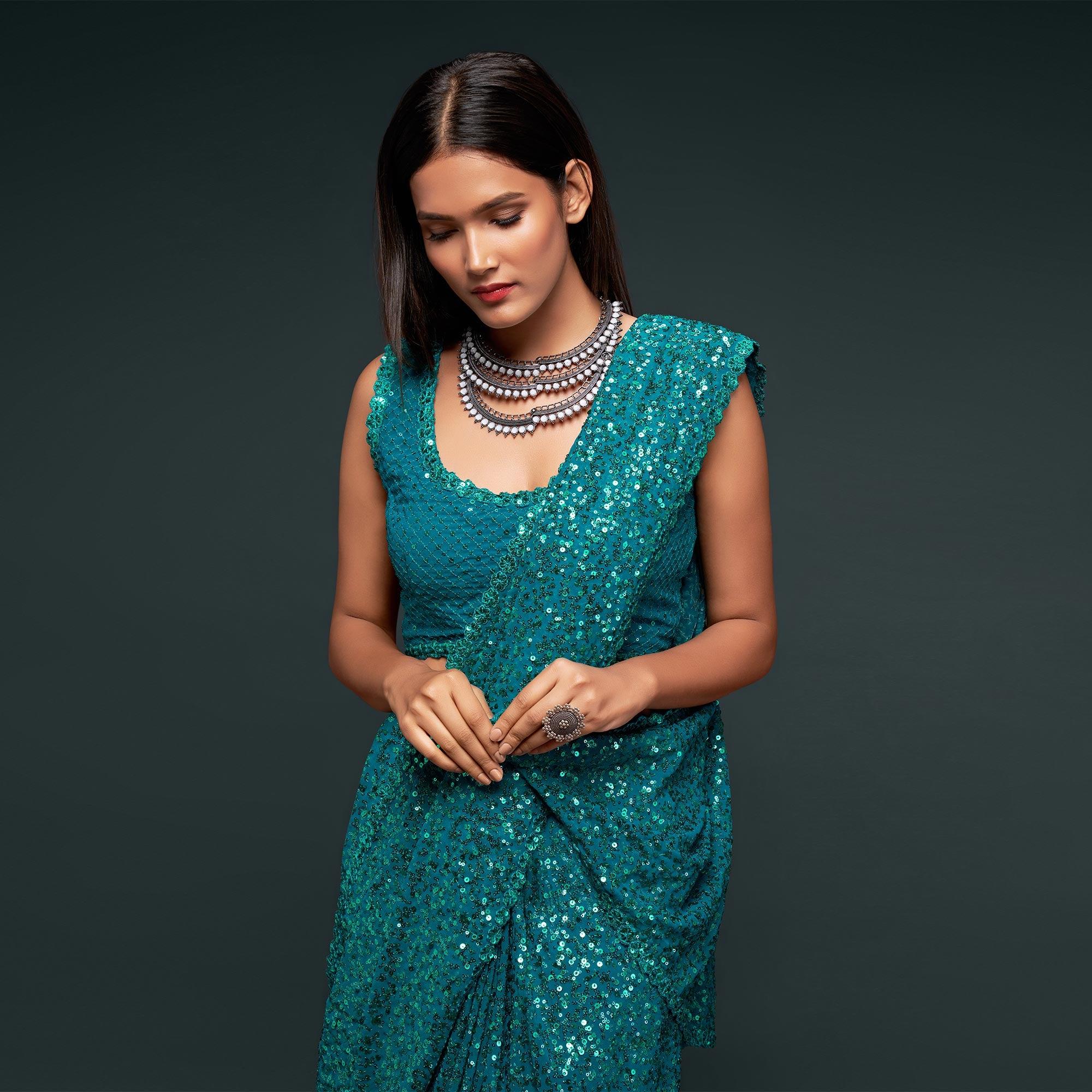 Teal Blue Partywear Thread & Sequins Embroidered Georgette Saree - Peachmode