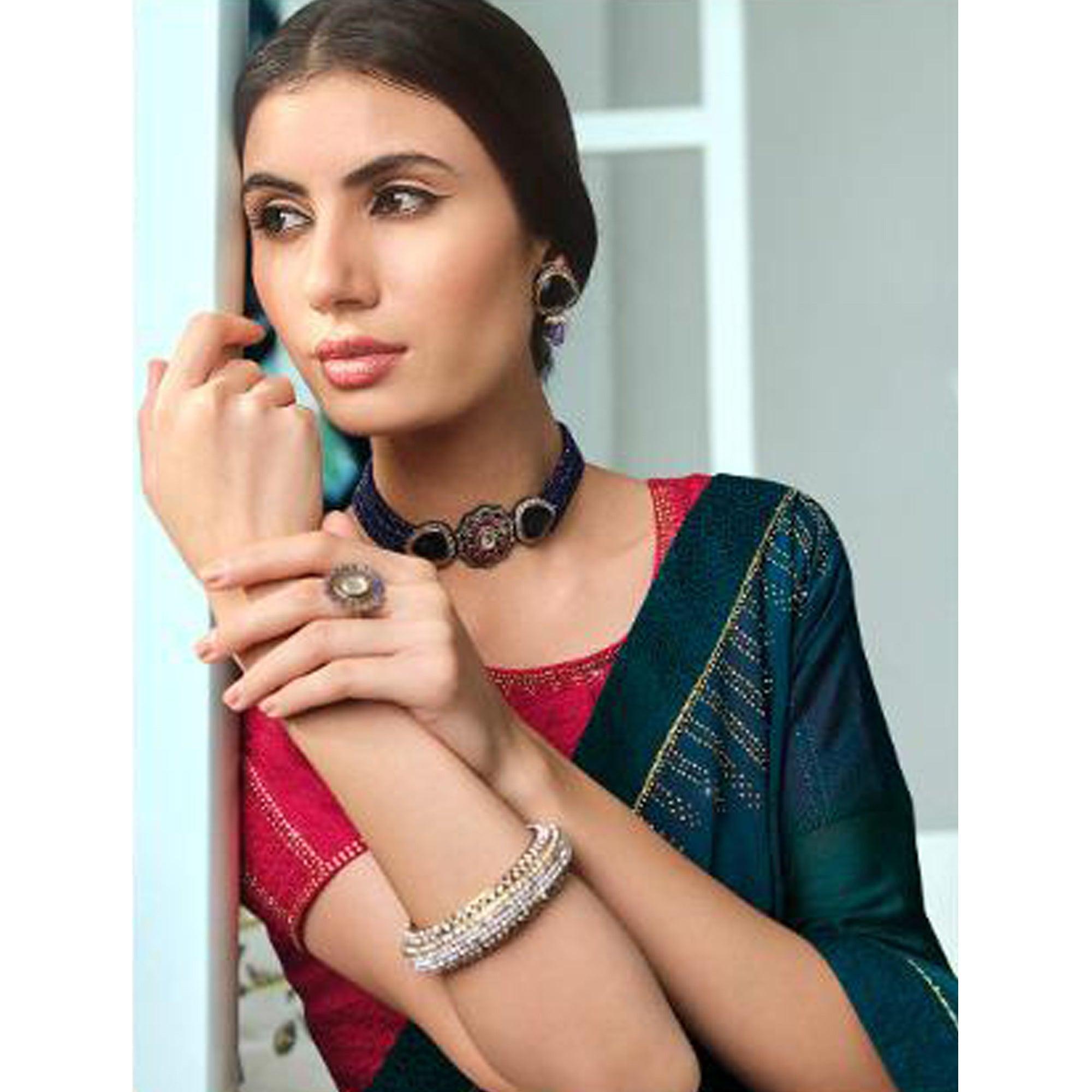 Teal Green Partywear Foil Printed Georgette Saree - Peachmode